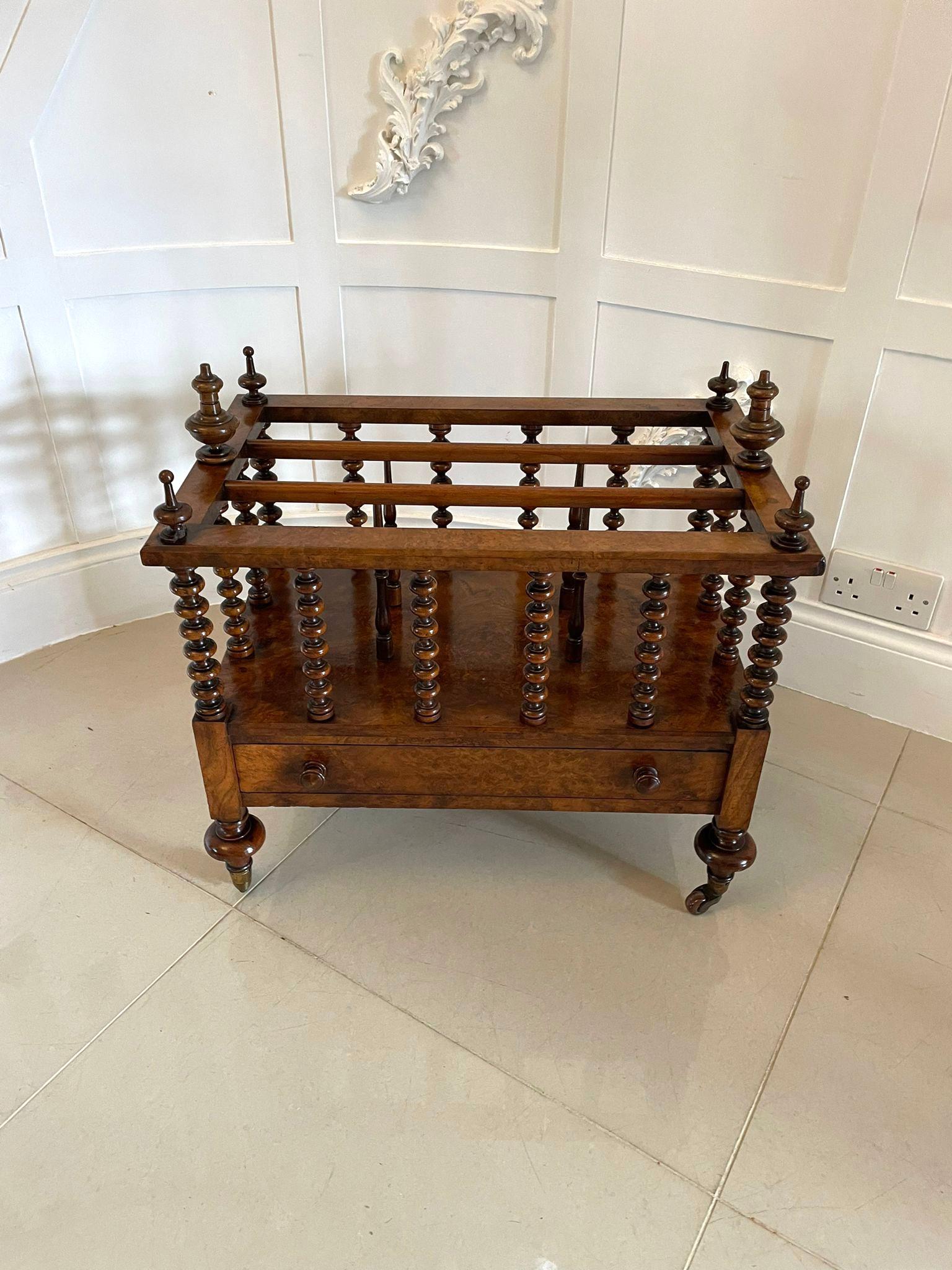 Large fine quality antique Victorian burr walnut canterbury having six turned solid walnut finials to the top, burr walnut frieze with bobbin turned columns, three book sections to the centre, one burr walnut drawer to the frieze and standing on
