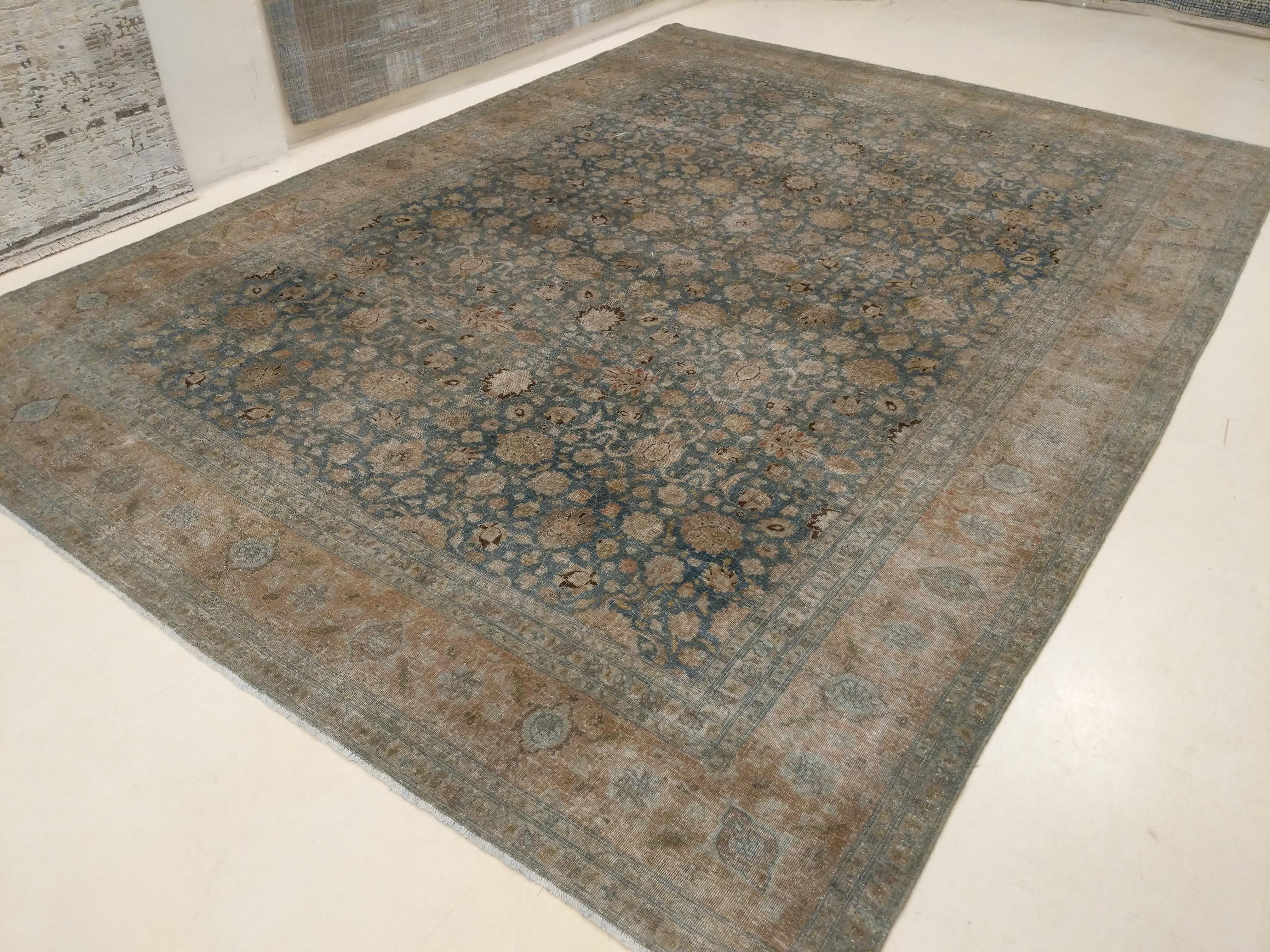A finely woven old Anatolian carpet of great nobility, distinguished by an infinite repeat pattern of delicately colored cloudband palmettes and rosettes floating on an aqua-teal background. One of our most beautiful recent acquisitions in terms of