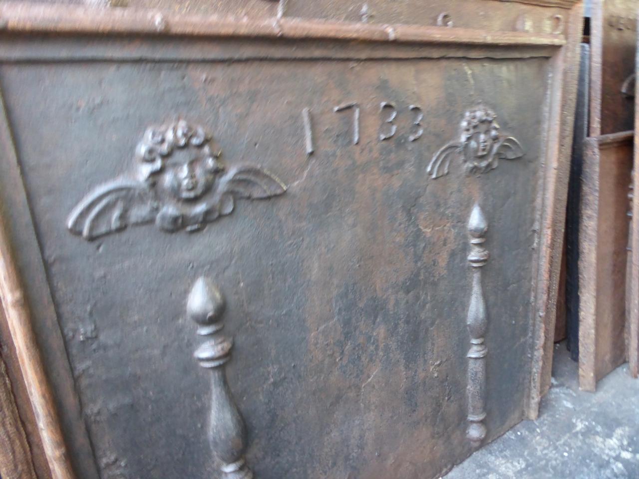 Large Fireback / Backsplash with Pillars of Hercules with Angels, Dated 1733 In Fair Condition For Sale In Amerongen, NL