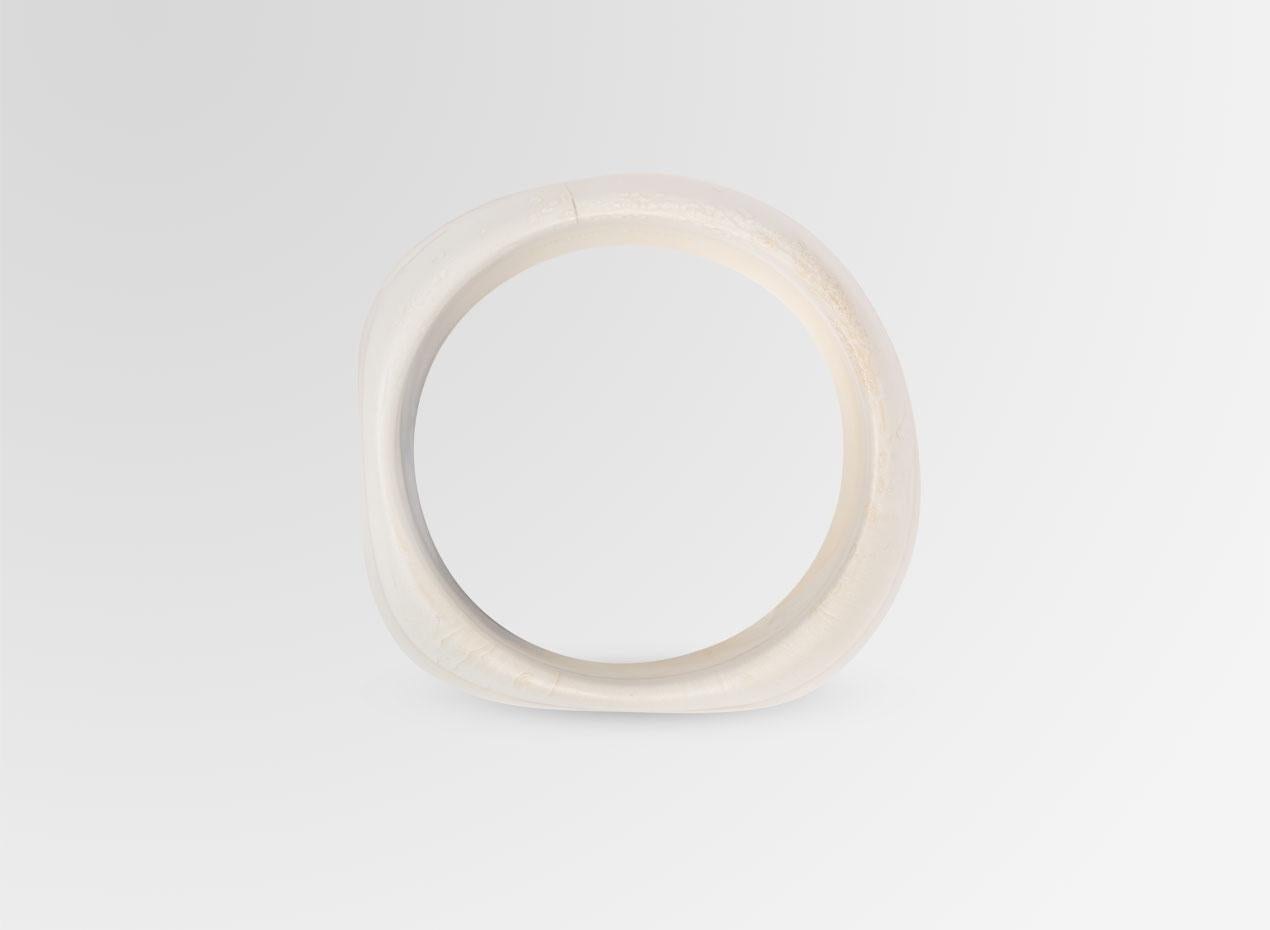 Resin organically shaped bangle. This bangle is featured in our Classic colour, Sandy Pearl. 

Dinosaur Designs resin products are hand made in Sydney, Australia. Each piece is unique and we cannot guarantee you will receive an item exactly