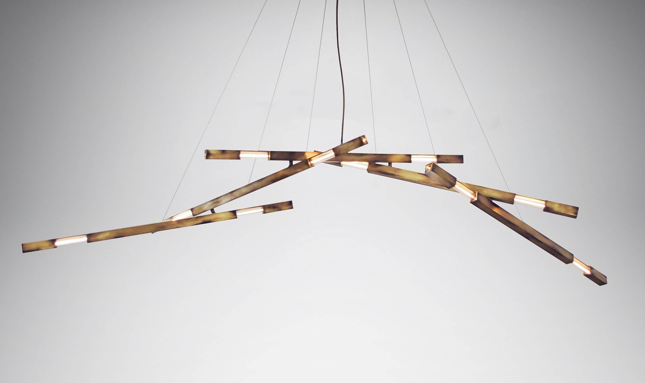 Grand Dynamic Stilk Chandelier  Daikon

material options: steel, brass, stainless steel

The Grand Daikon Stilk Chandelier features a quintet (5) of illuminated branches. Each branch is connected using dynamic swivel mounts. The dynamic swivel