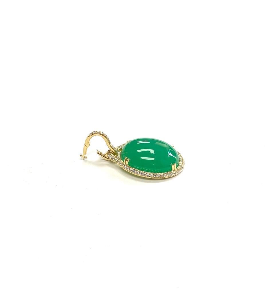 Large Flat Oval Chrysoprase Pendant with Diamonds in 18k Yellow Gold, from 'G-One' Collection

Stone Size- 22 x 18 mm

Gemstone Weight: Chrysoprase- 33.82 Carats

Diamond: G-H / VS, Approx Wt: 1.04 Carats

*Chain Sold Separately