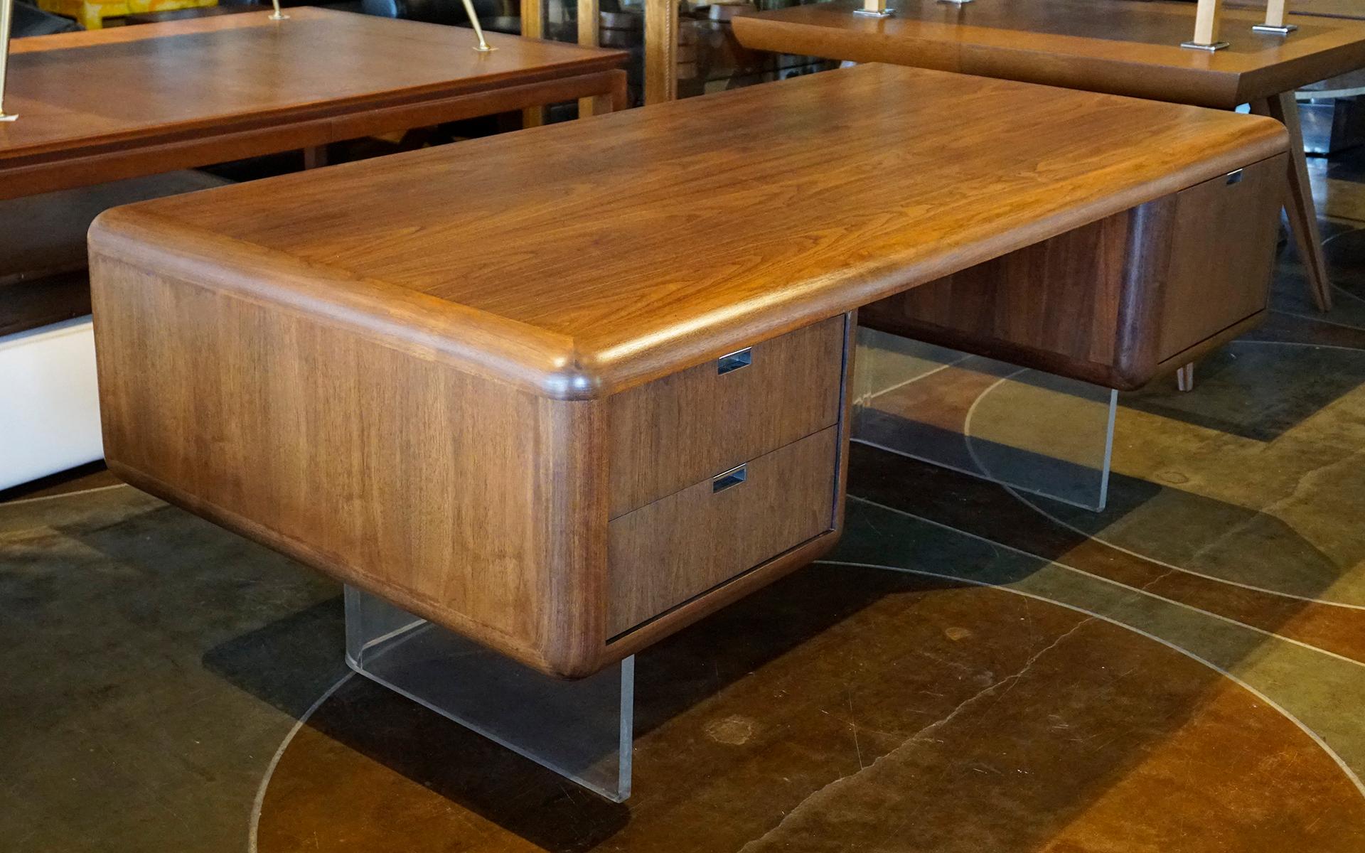 Mid-Century Modern Large Floating Walnut Modern Executive Desk on one inch Lucite Base. For Sale