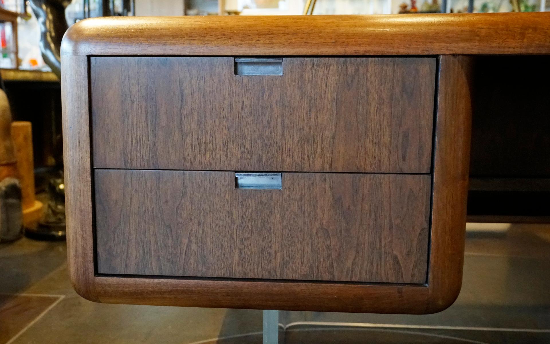 Mid-20th Century Large Floating Walnut Modern Executive Desk on one inch Lucite Base. For Sale