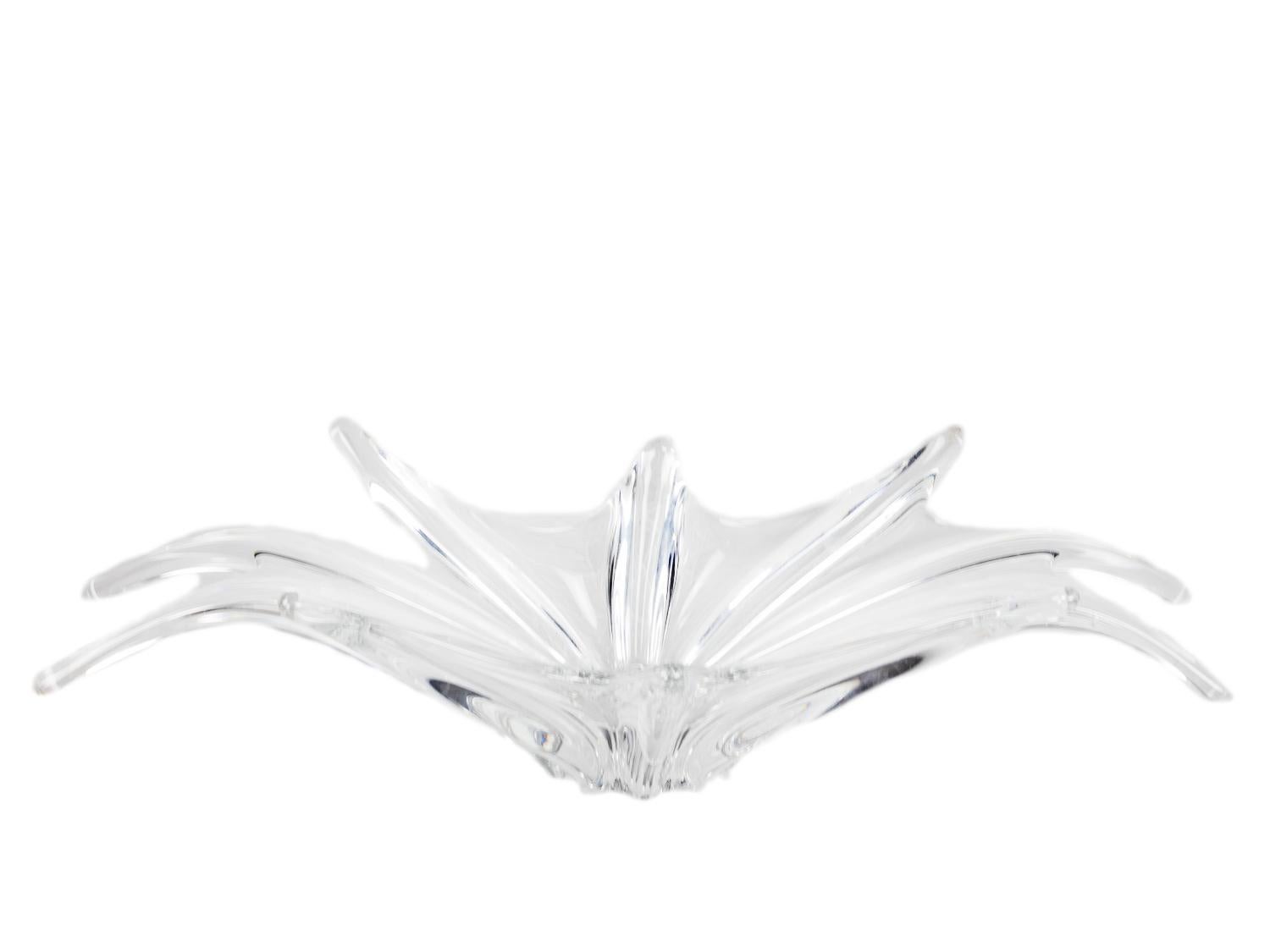 A translucent hand-blown crystal glass fruit bowl / centerpiece by Baccarat. 
On the bottom marked with an etched factory mark Baccarat from the region of Lorrene, France. 

THE BACCARAT LEGACY: THE MOLD STORAGE, ARCHIVE & MUSEUM
One can only