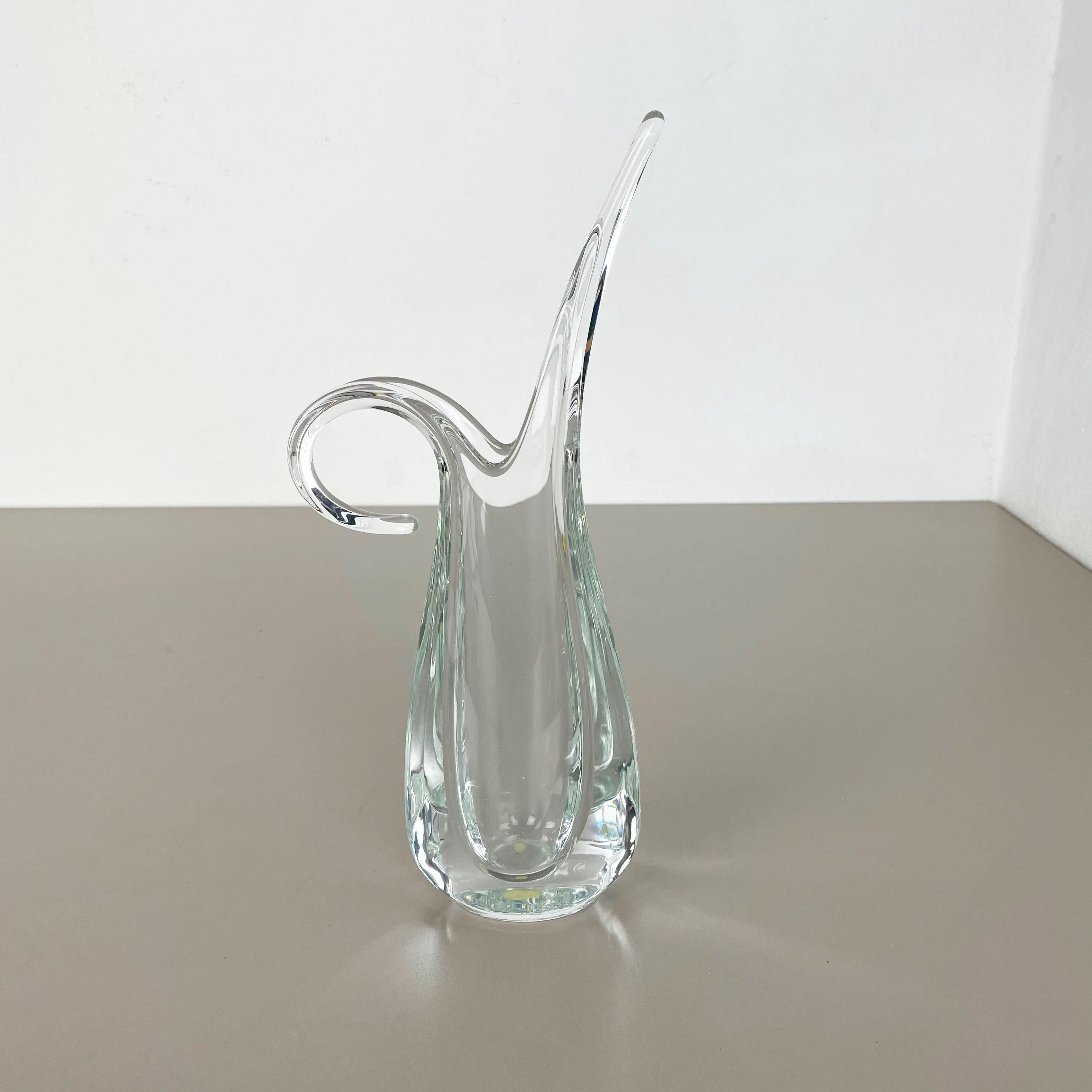Article: Crystal glass vase



Producer: ART VANNES FRANCE (marked)


Design: Flavio Poli attrib.



Age: 1970s



 

Wonderful heavy glass element designed by Flavio Poli and produced by Art Vannes in France in the 1970s. This glass vase is high