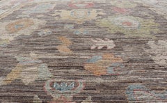 Large Floral Designed Modern Oushak on a Brown-Gray Field and Cream Border