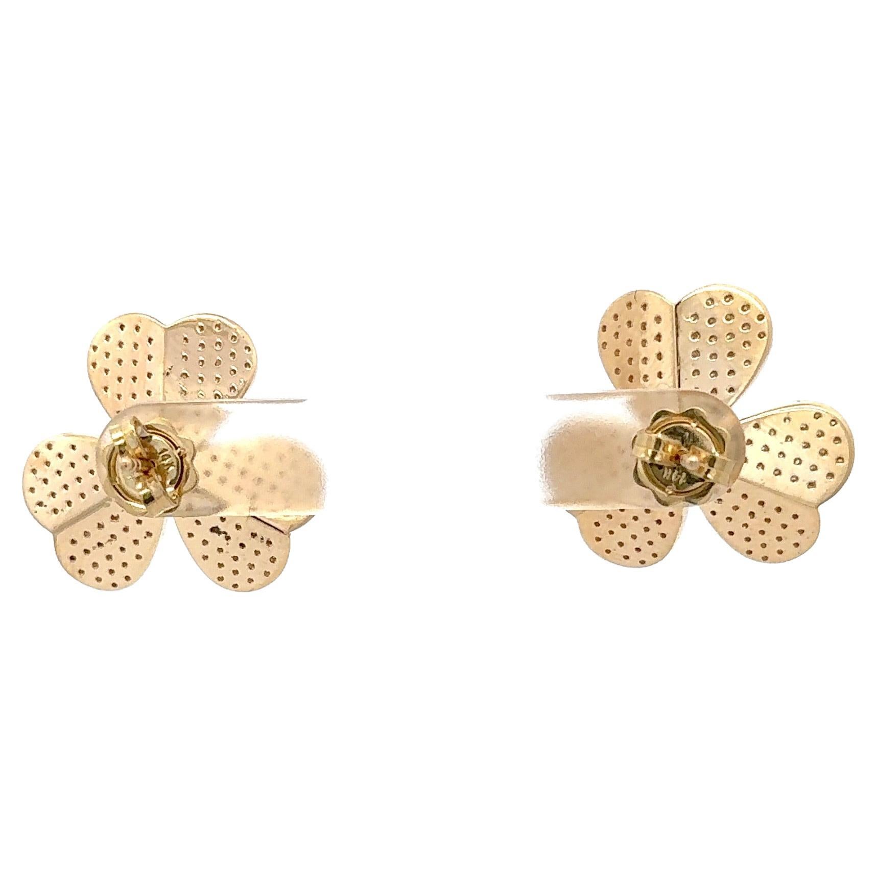Large diamond stud earrings featuring a floral design containing 306 round brilliants weighing 2.02 carats, in 14 karat yellow gold. 
Color F
Clarity VS