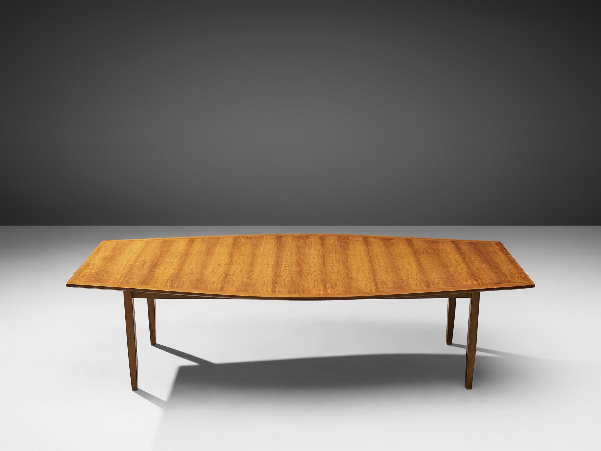 Florence Knoll for Florence Knoll International, large dining table, model 580 H, walnut, United States, 1963. Measures: 8.8 ft.

Large dining or conference table with boat shaped top in walnut. The table has four tapered wooden legs. The top of