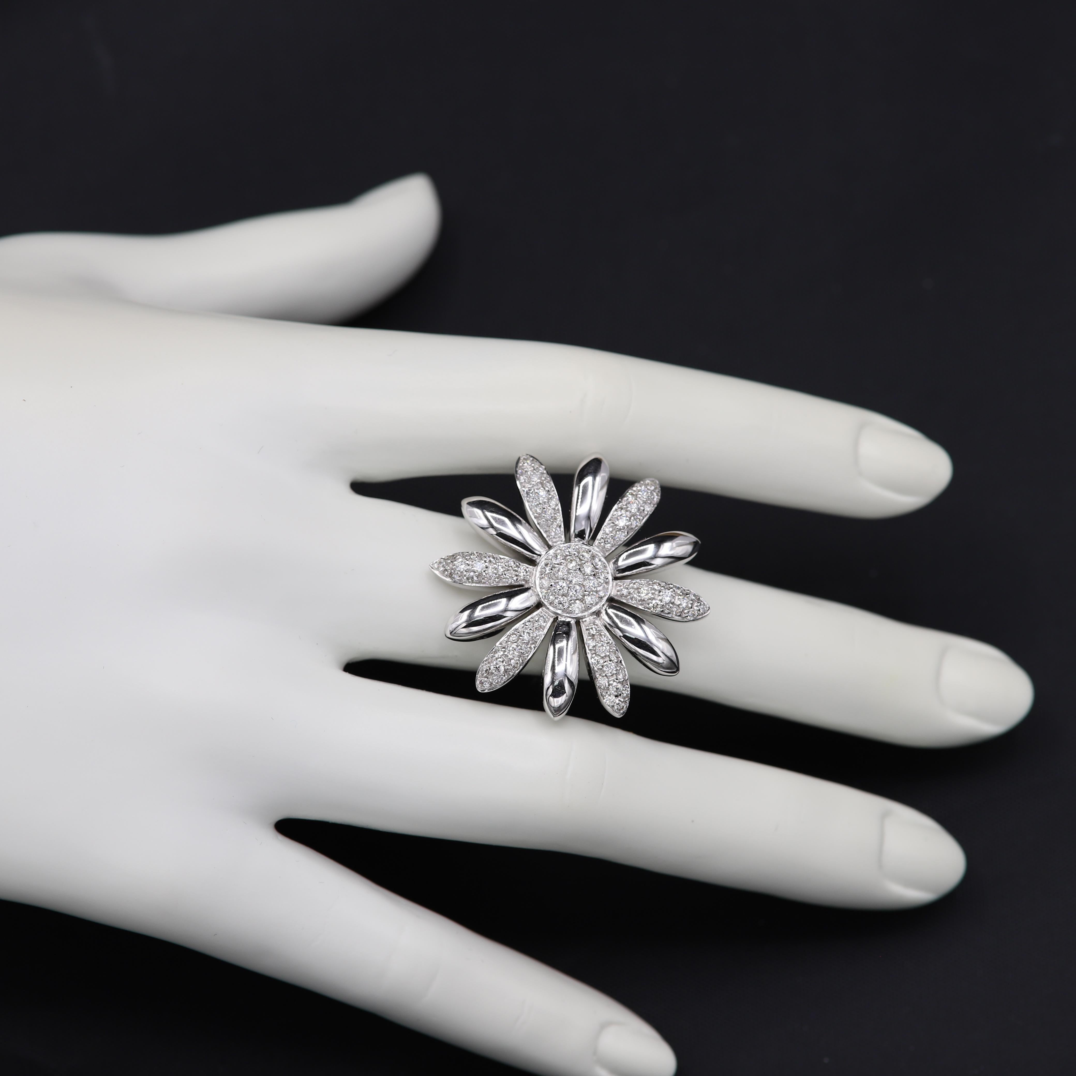 Unique Large Flower Ring
18k White Gold 19.25 grams
Total Diamonds 1.37 carat G-VS
Finger Size 6.75
overall flower size 1.25' inch (35mm) 