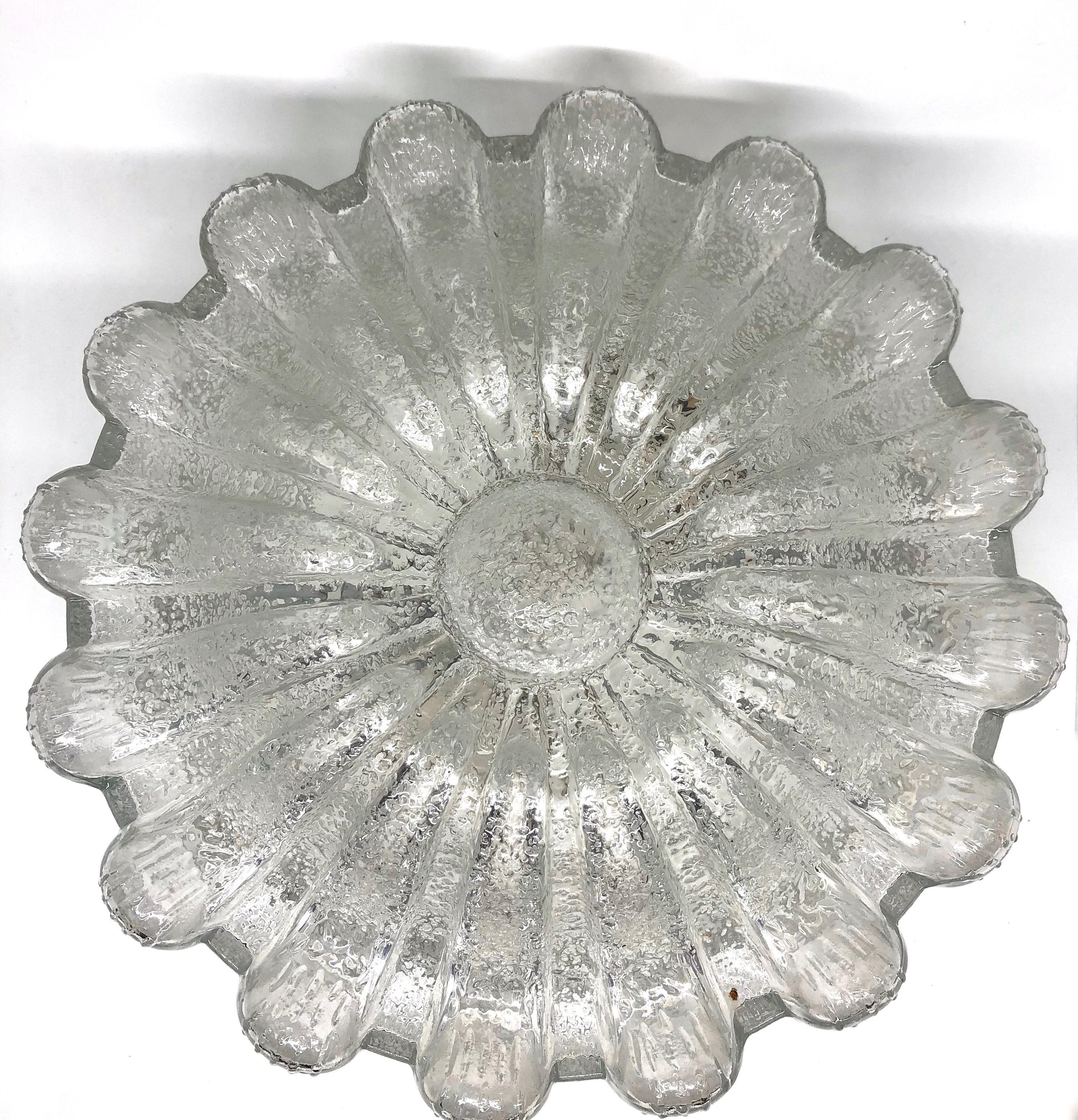 Beautiful flower shape flushmount. Made in Germany by Glashütte Limburg. Gorgeous textured glass flush mount with metal fixture. The glass has a very cute design. The fixture requires two European E27 / 110 volt Edison bulbs, up to 60 watts each.