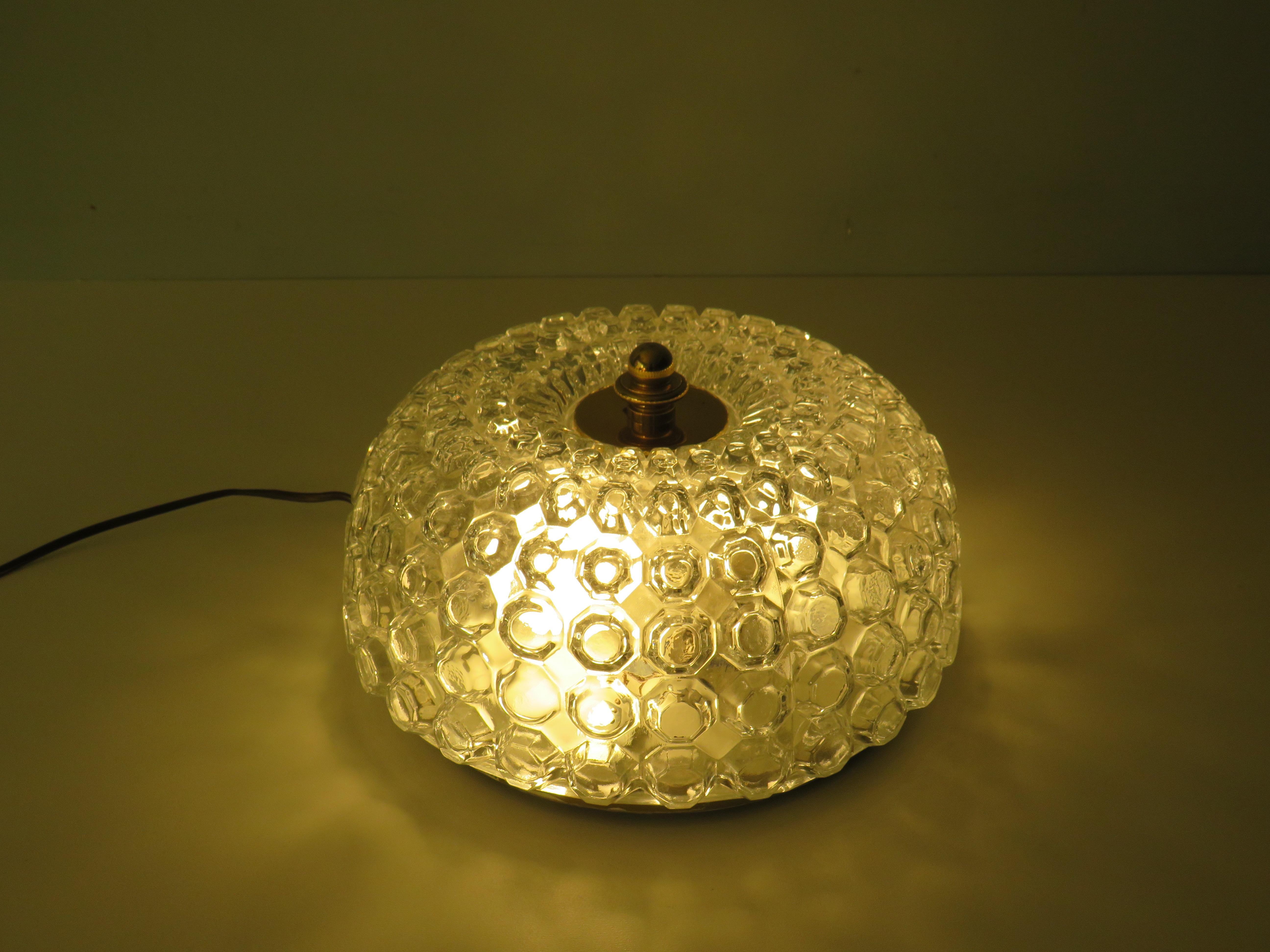 Large round bubble glass flush mount with gold metal mounting plate and gold metal cap. The lamp can be used as a ceiling lamp or wall lamp.
The ceiling lamp is equipped with 2 porcelain E 27 fittings and is compatible in all countries (Europe, US,