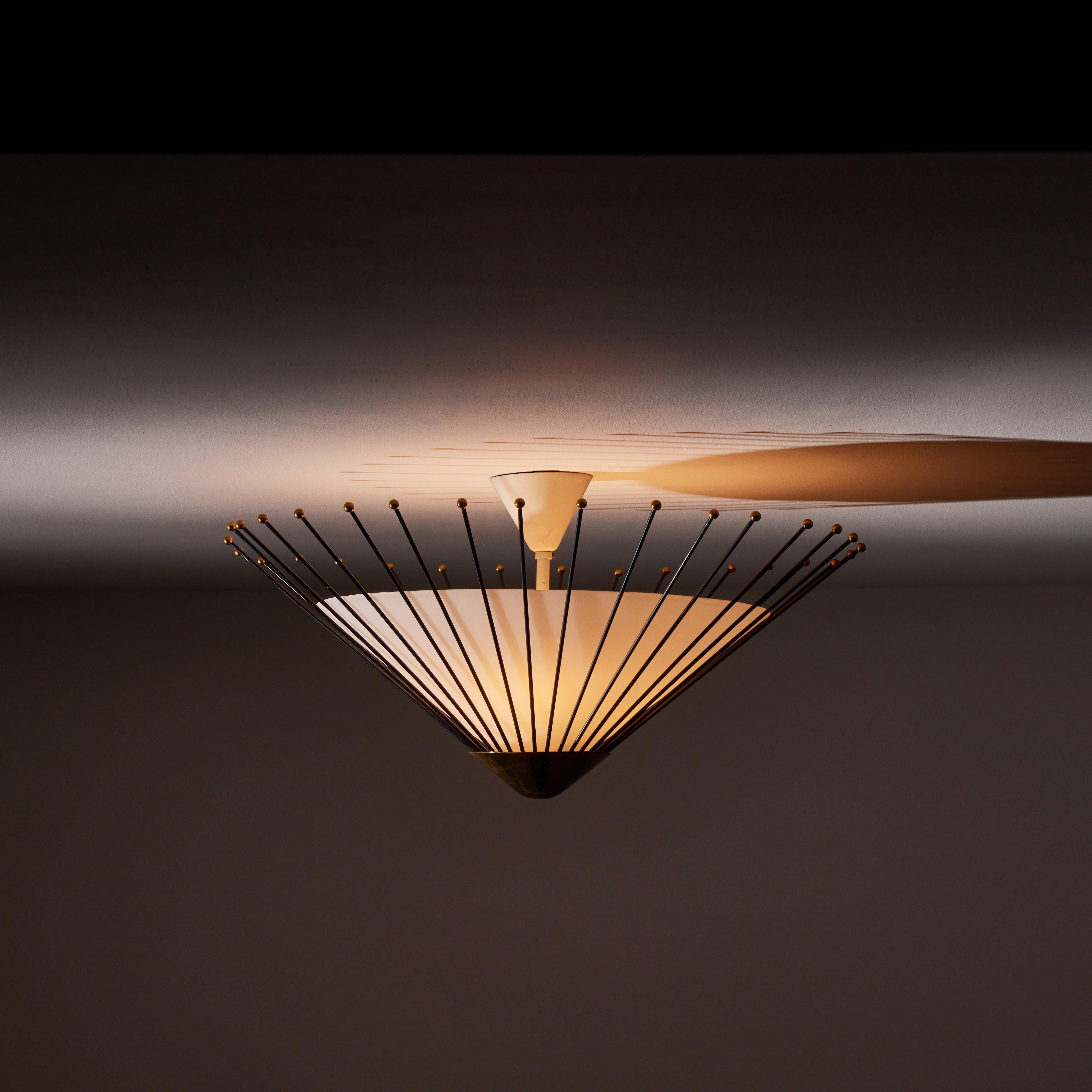 Large flushmount ceiling light by Stilux. Manufactured in Italy, circa 1950s. Opal glass, painted metal, brass. Custom brass ceiling plate. Wired for U.S. standards. We recommend three E27 25w maximum bulbs. Bulbs provided as a one time courtesy.