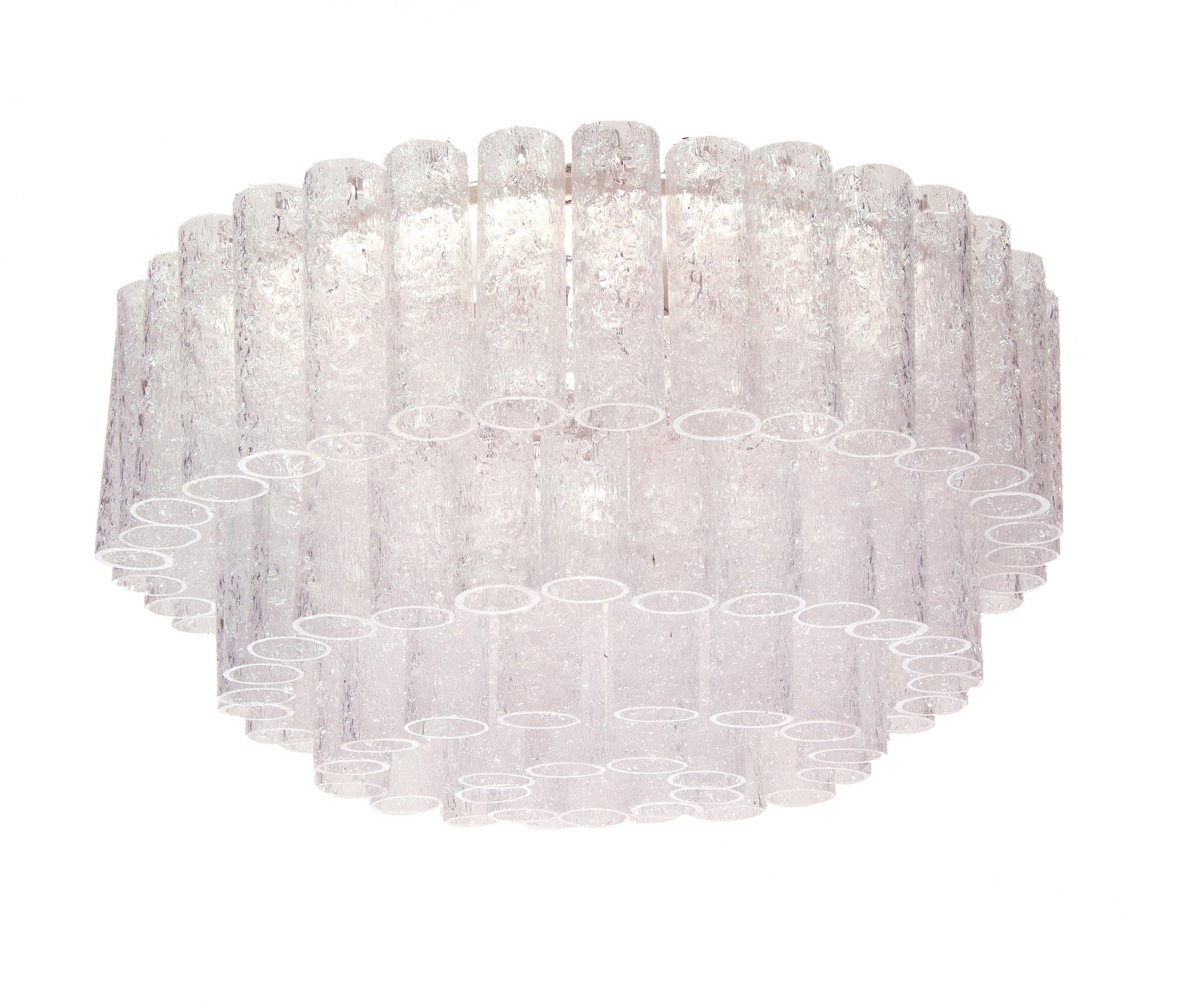 Elegant large four-tier Murano flush mount ceiling light with sixty clear glass tubes on a white metal frame. Chandelier illuminates beautifully and offers a lot of light. Gem from the time. Manufactured by Doria, Germany in the 1960s. 

Measures: