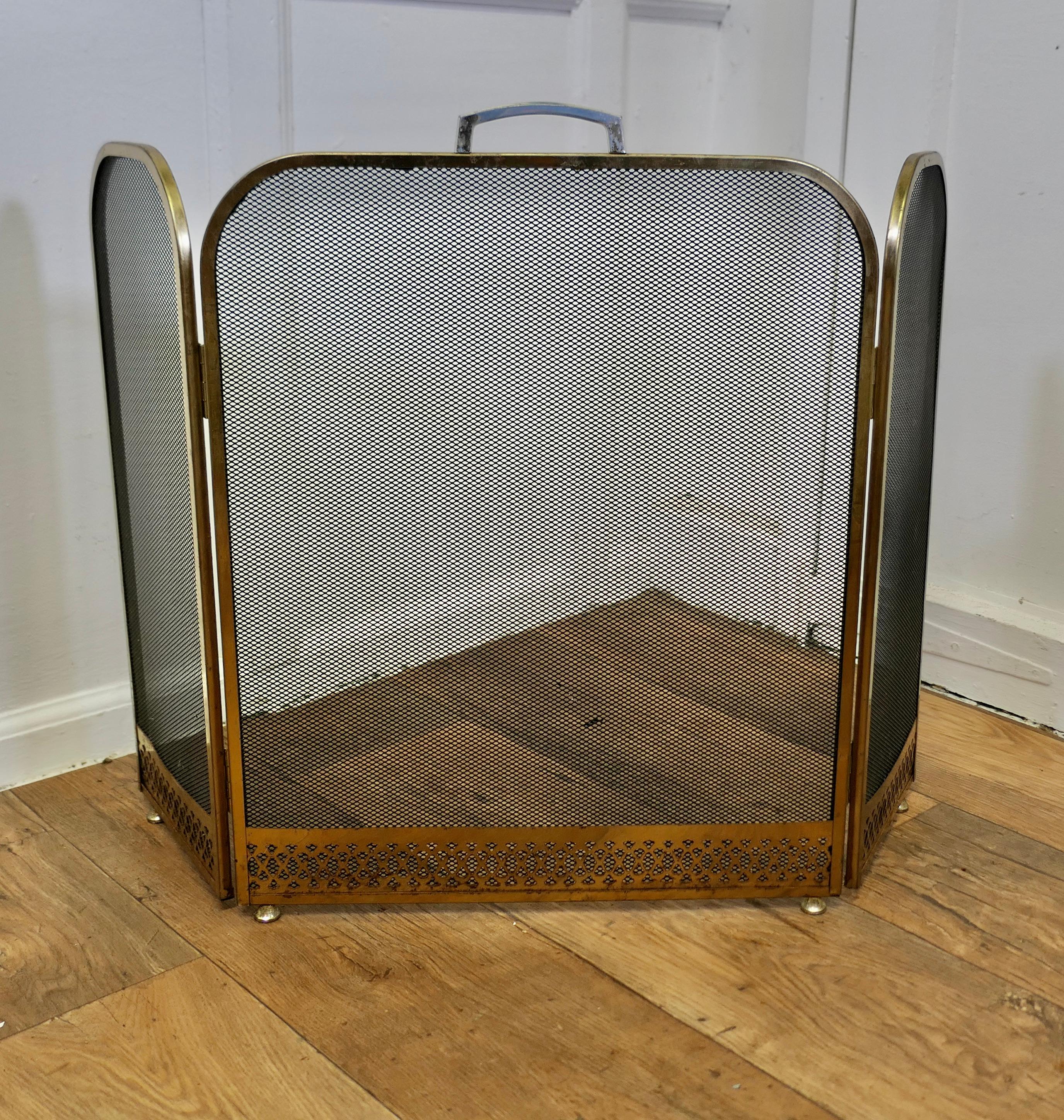 Large Folding Brass Fire Guard 

This very useful spark guard has a decorative brass frame and a fine mesh infill, it has the added advantage that it folds flat for storage, and when opened out it can be shaped to enclose your fire, very useful for