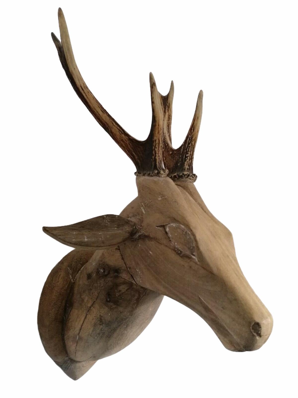 A great looking hand carved original wooden Folk Art deer head wall decoration. A great piece for a suitable ambiance in a trophy room or the office of a Hunter or Woodsman. More than likely one of the Folk Art items made between 1860 and the late