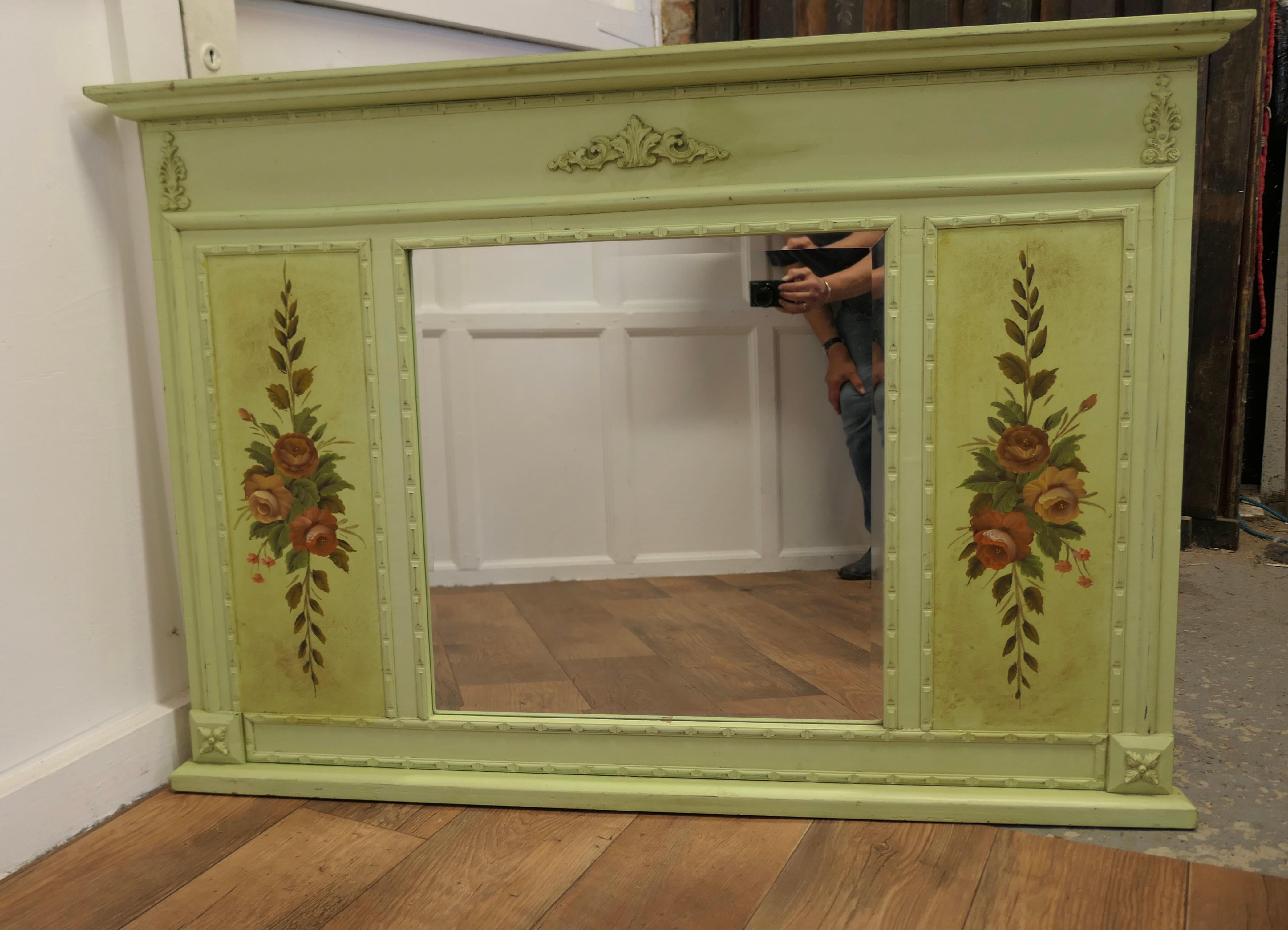 Large Folk Art Painted Overmantel or Wall Mirror

This is a Large piece with a bevelled mirror at the centre, the Frame has painted floral decoration at each side
The Overmantel is in good Sound good sound condition
The Mirror Frame is 35” high