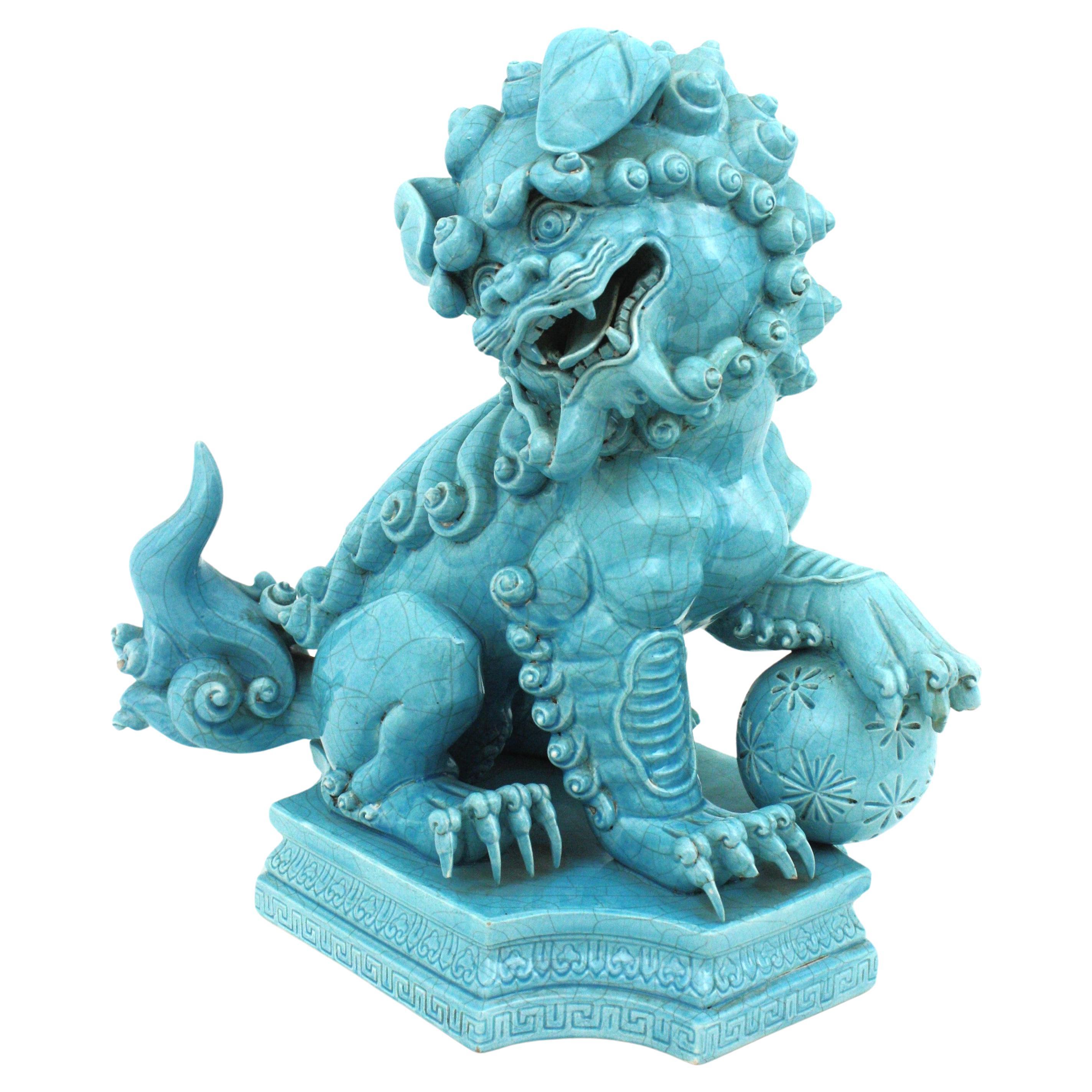 Large Size Male Guardian Lion Foo Dog in Turquoise Blue Glazed Porcelain
Algora Porcelains
Designed from 1920 to 1949.
This is a male guardian lion sculpture, is recognized as it is resting his paw on the ball.
For thousands of years, these majestic