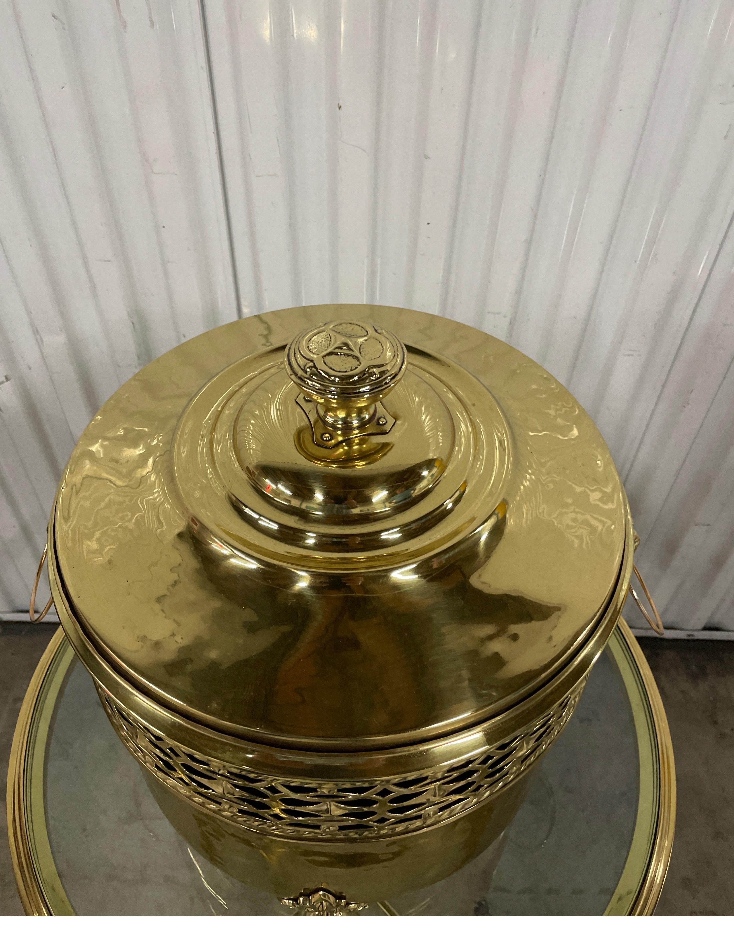 Vintage footed brass container with Lion's head details and covered top.
Pierced detailing completely around circumference. Wonderful detail throughout.