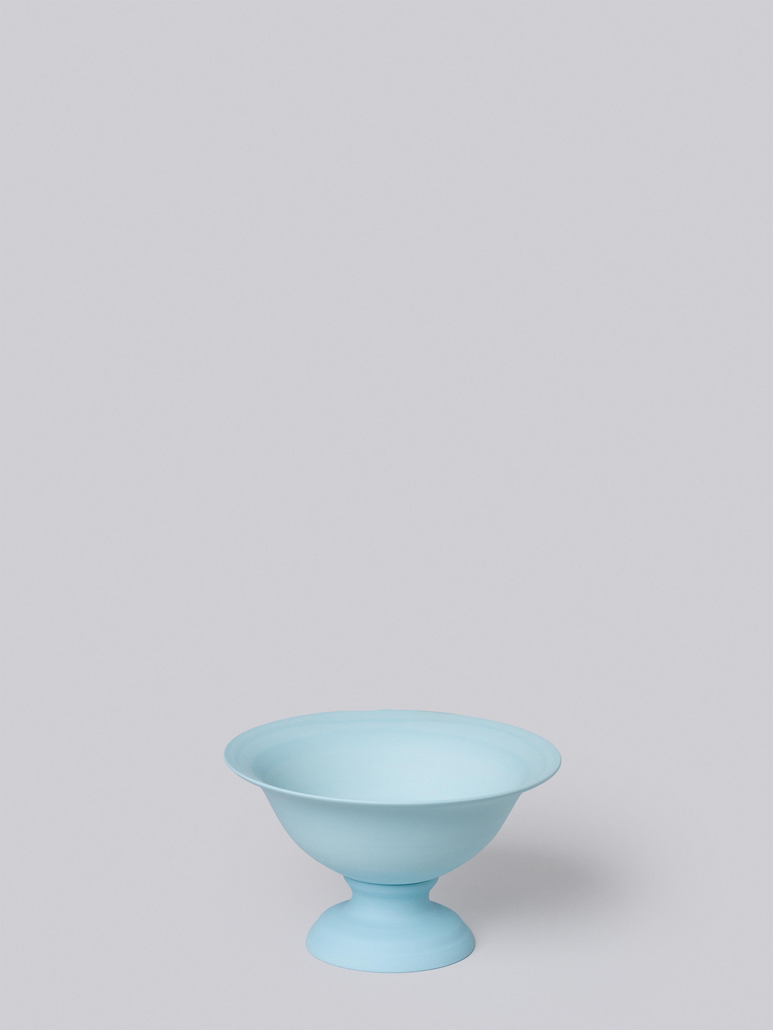 Middle Kingdom garden vaso are modeled after traditional terra cotta wares but are made from pigmented porcelain. The bowl can be moved from the base for planting and watering. The classic, elegant style of this planter belies its supreme