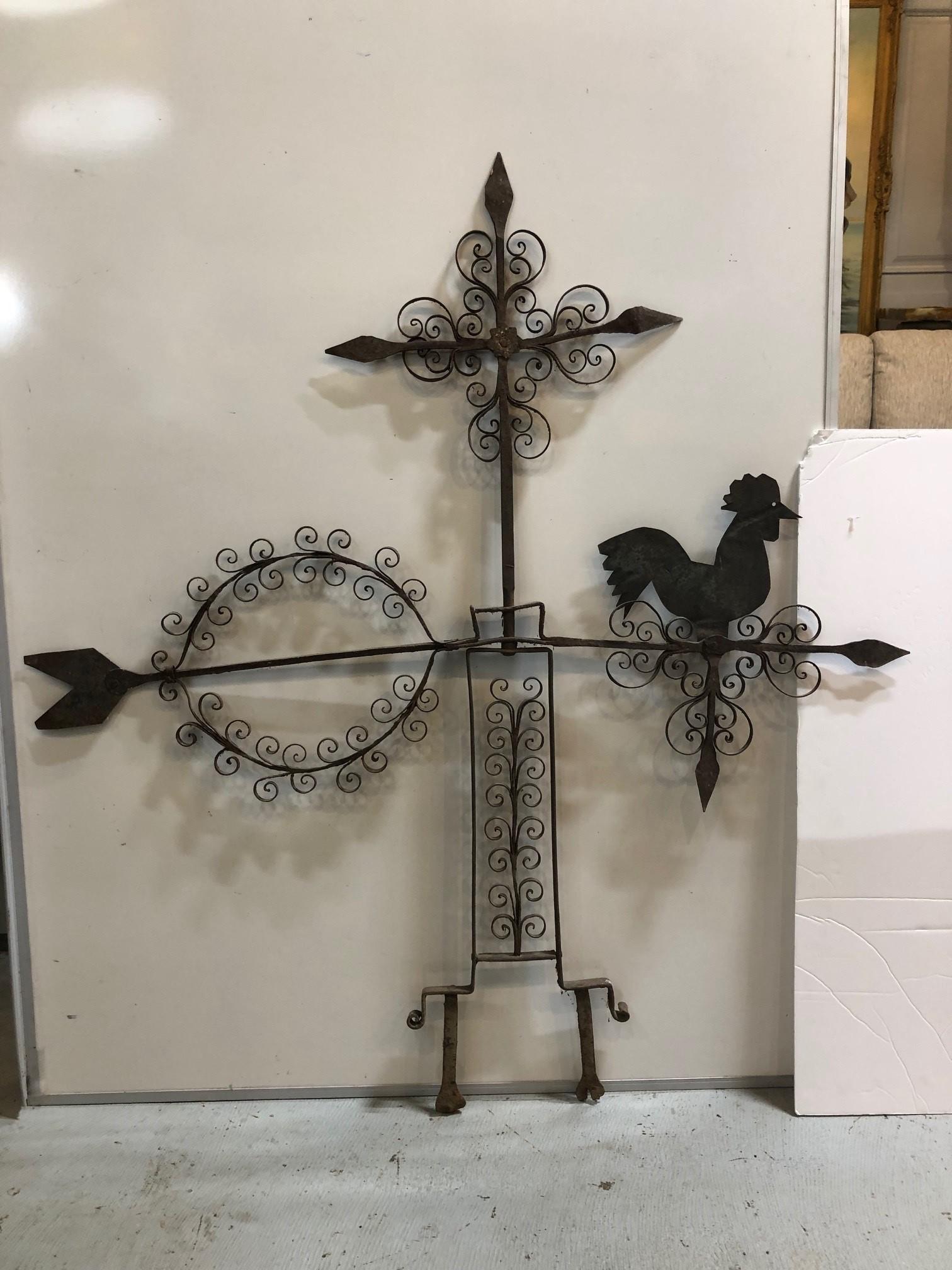 Large Folk Art wrought iron rooster weathervane in good condition for its age ca 1940s . This weathervane is a good size which would look great in a garden or any backyard. Its a fun piece of Folk Art most likely from Mexico it has a nice look.