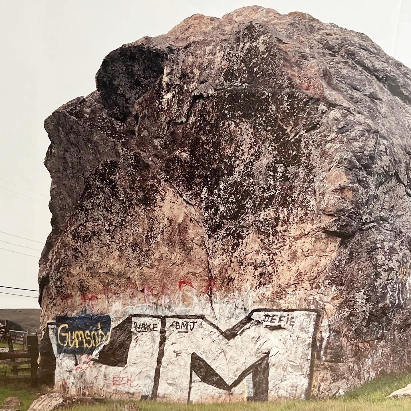 A large-format C-Print photograph by Mary Parisi, framed in ebonized wood, early aughts. A landscape depicting graffiti on an immense boulder. Immaculate condition and ready to hang. Pick up in LA or worldwide shipping