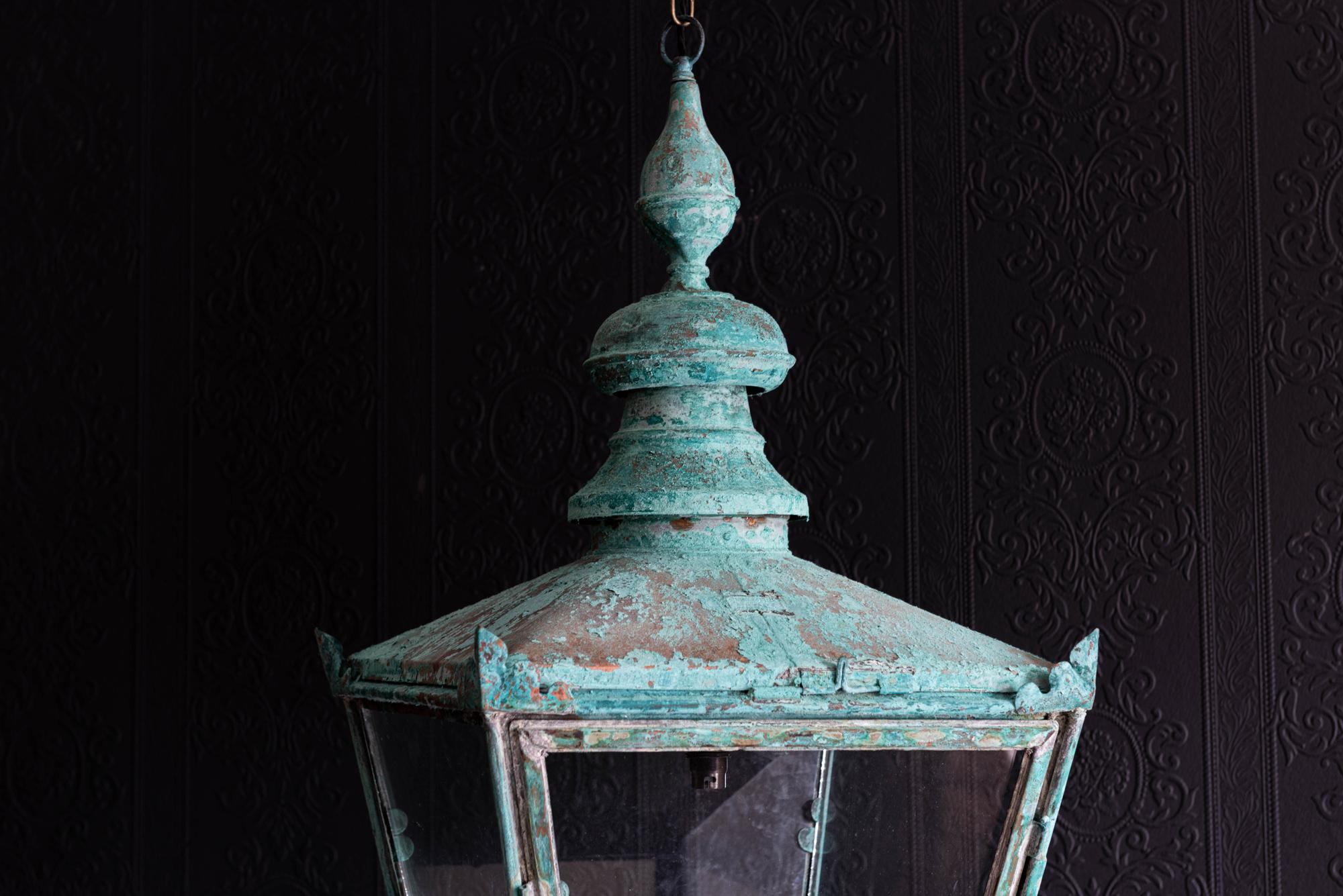 Large Foster & Pullen verdigris copper lantern,
circa 1870.

With hinged canopy & door, Foster & Pullen Bradford name plate in place.

Comes with 1m of silk flex, 1m of heavy gauge antique brass chain and bronze ceiling hook.

Re-glazed