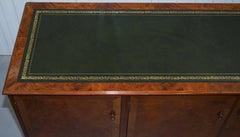 Large four Bank Burr Walnut Sideboard with Gold Tooled Green Leather Surface