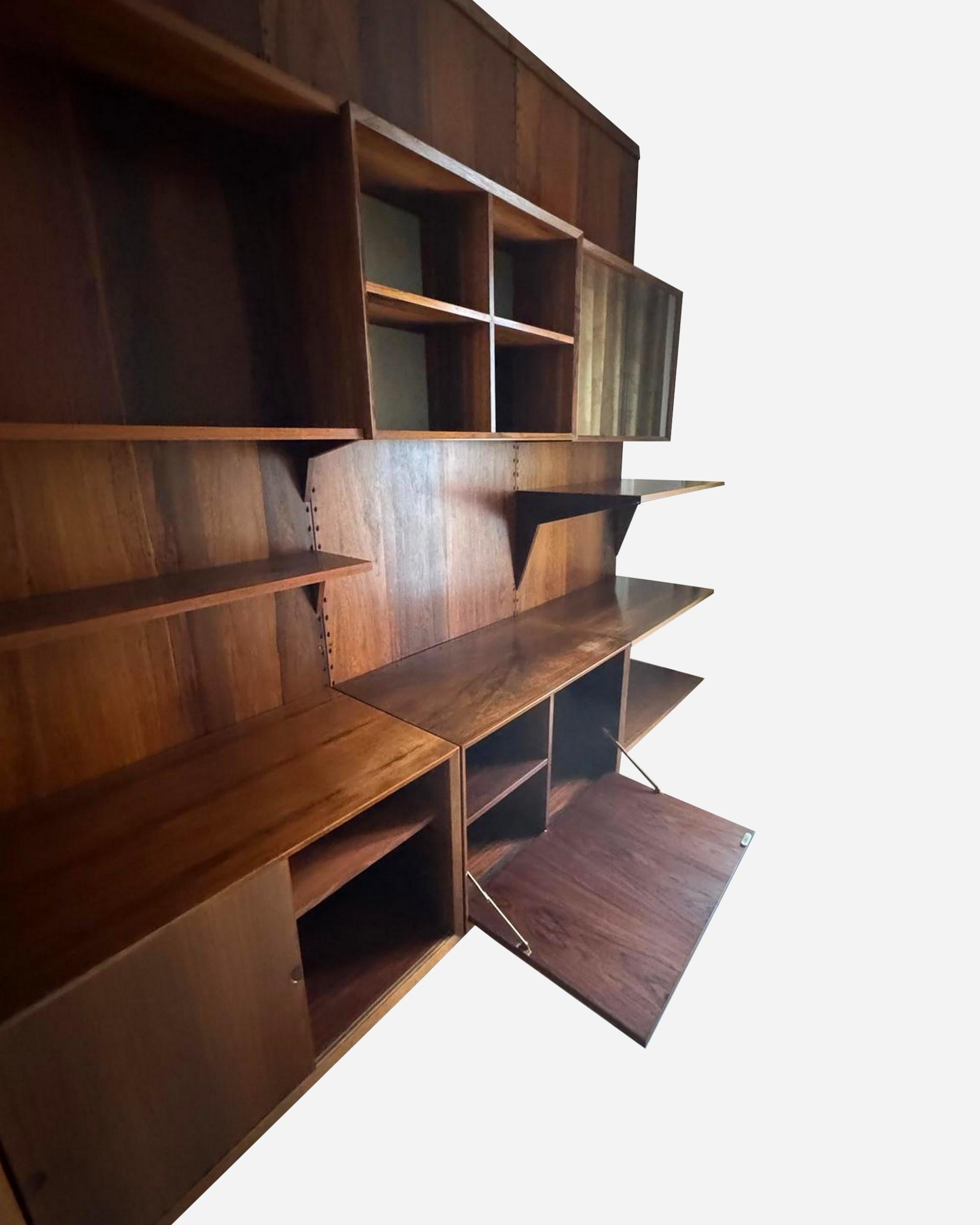 Danese Large four-part bookcase, by Poul Cadovius, Editions CADO, Denmark, circa 1960 in vendita