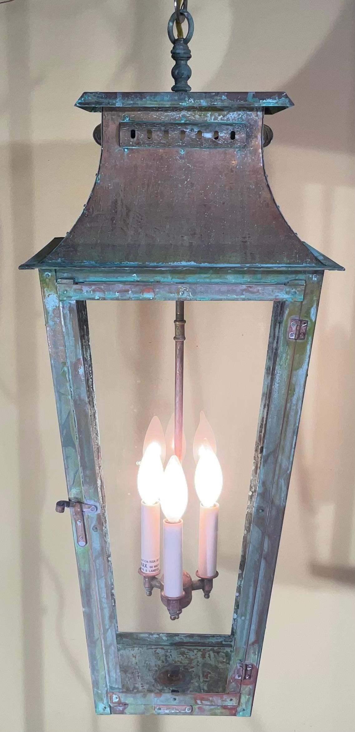 Quality handcrafted of solid copper lantern , beautiful patina ,with three 60/watt lights.
Electrified and ready to light. Beautiful oxidization patina.
Made in the US 
Could be used in wet location.