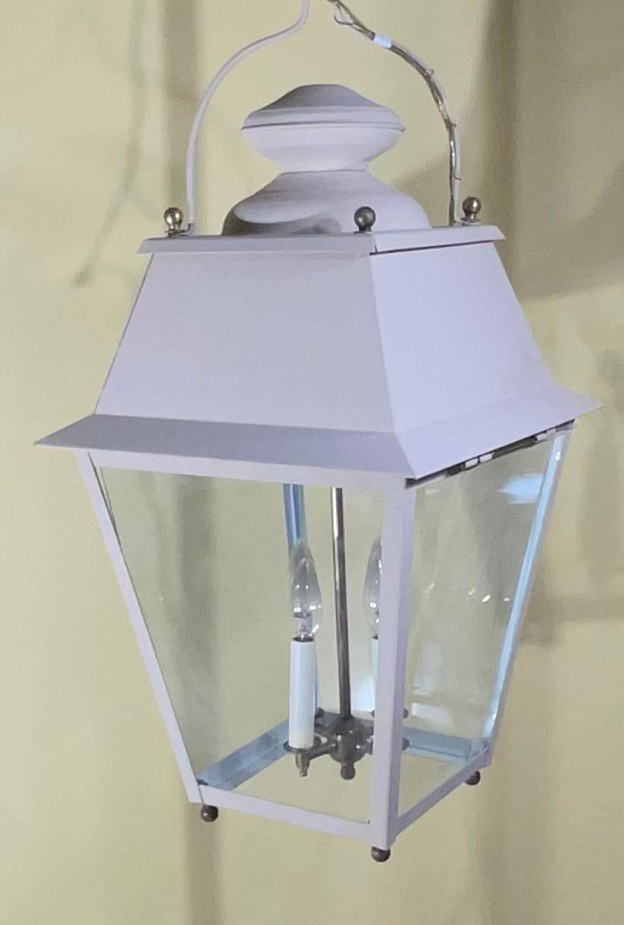Elegant large hanging lantern handcrafted from solid brass, clear glass ,hand painted on brass.
With four 40/watt lights, suitable for hanging in wet location, Ready to use. UL approved.
Original canopy and chain included.
