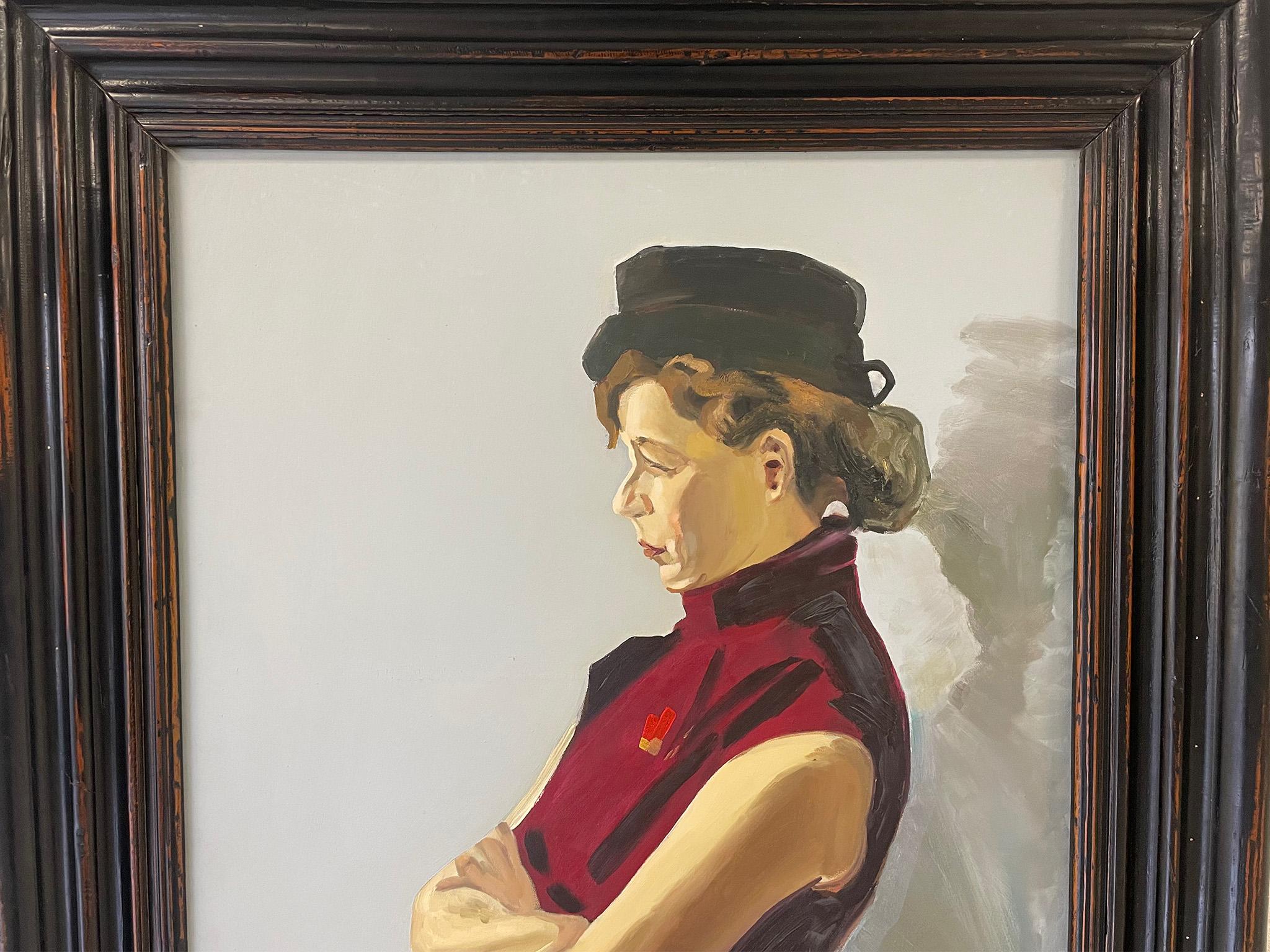Charming large scale portrait, depicting the side profile of a woman with arms crossed looking off canvas in a sleeveless crimson dress. The painting is held in a sturdy wood frame with intentional antique distressing. The moving label on the back