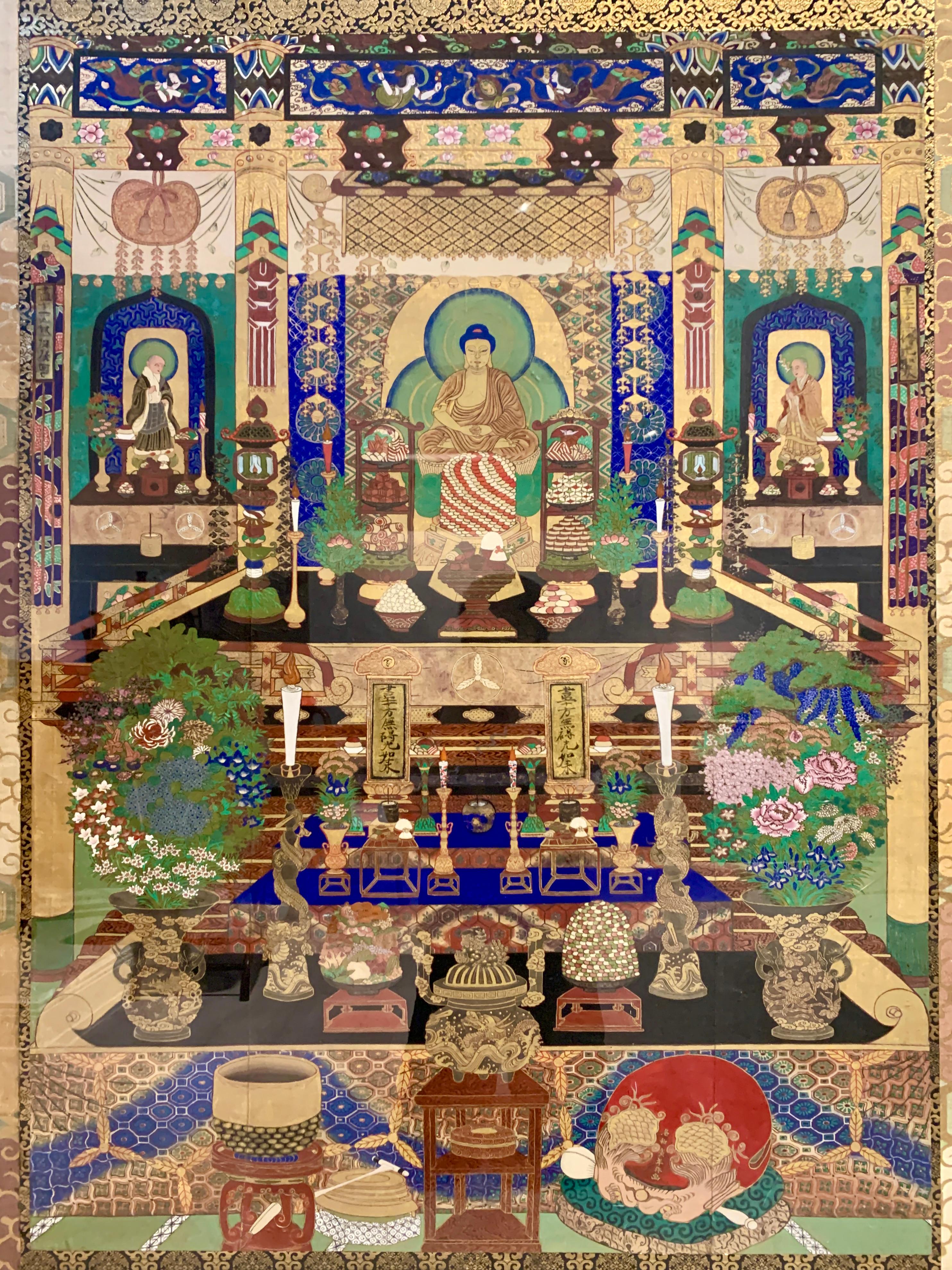 A large and incredible Japanese painting of a Buddhist temple hall with Amida Nyorai, late Edo or early Meiji period, mid-19th century, Japan. Mounted with silk brocade and framed in a heavy, carved and gilt frame.

The painting depicts an opulent