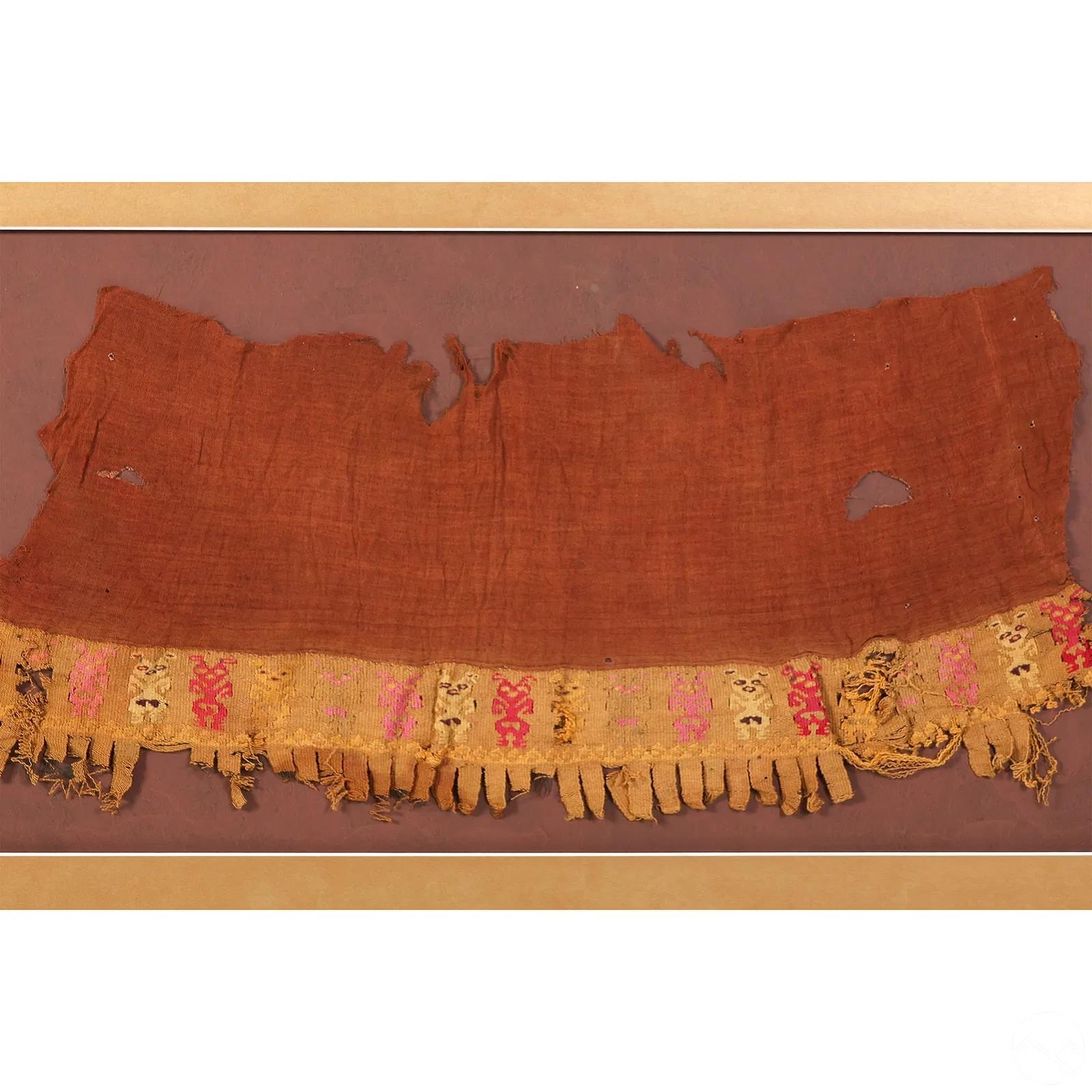 A large fragment of antique pre-Columbia textile panel from Chimu or Chancay culture located in Central and Northern Coast of nowadays Peru. Chancay culture thrived in the late Intermediate period/ late Horizon circa 1000-1470 CE until it was