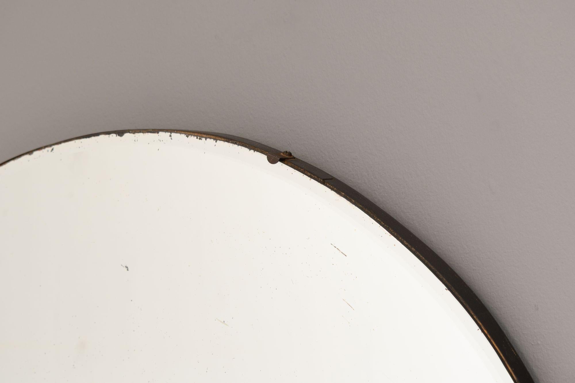 Grande specchio senza cornice della metà del XX secolo. Circa 1950.

H. 85 cm x L. 77 cm x P. 3 cm
