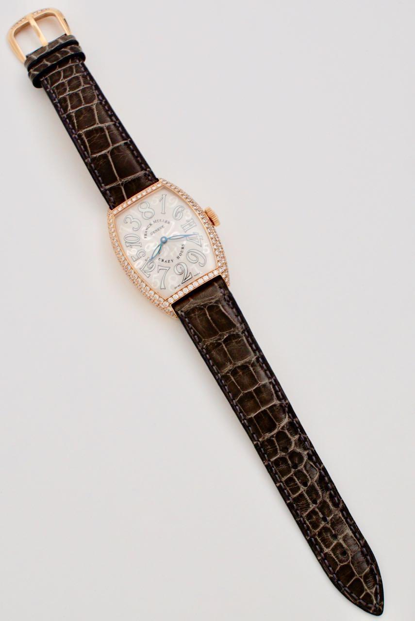 A large Franck Muller Master of Complications Crazy Hours Wristwatch - this iconic automatic movement watch has an 18k rose gold case pavé set with 168 diamonds (approx 3.30cts  and graded in the setting as F/VS) , sapphire crystal glass above a