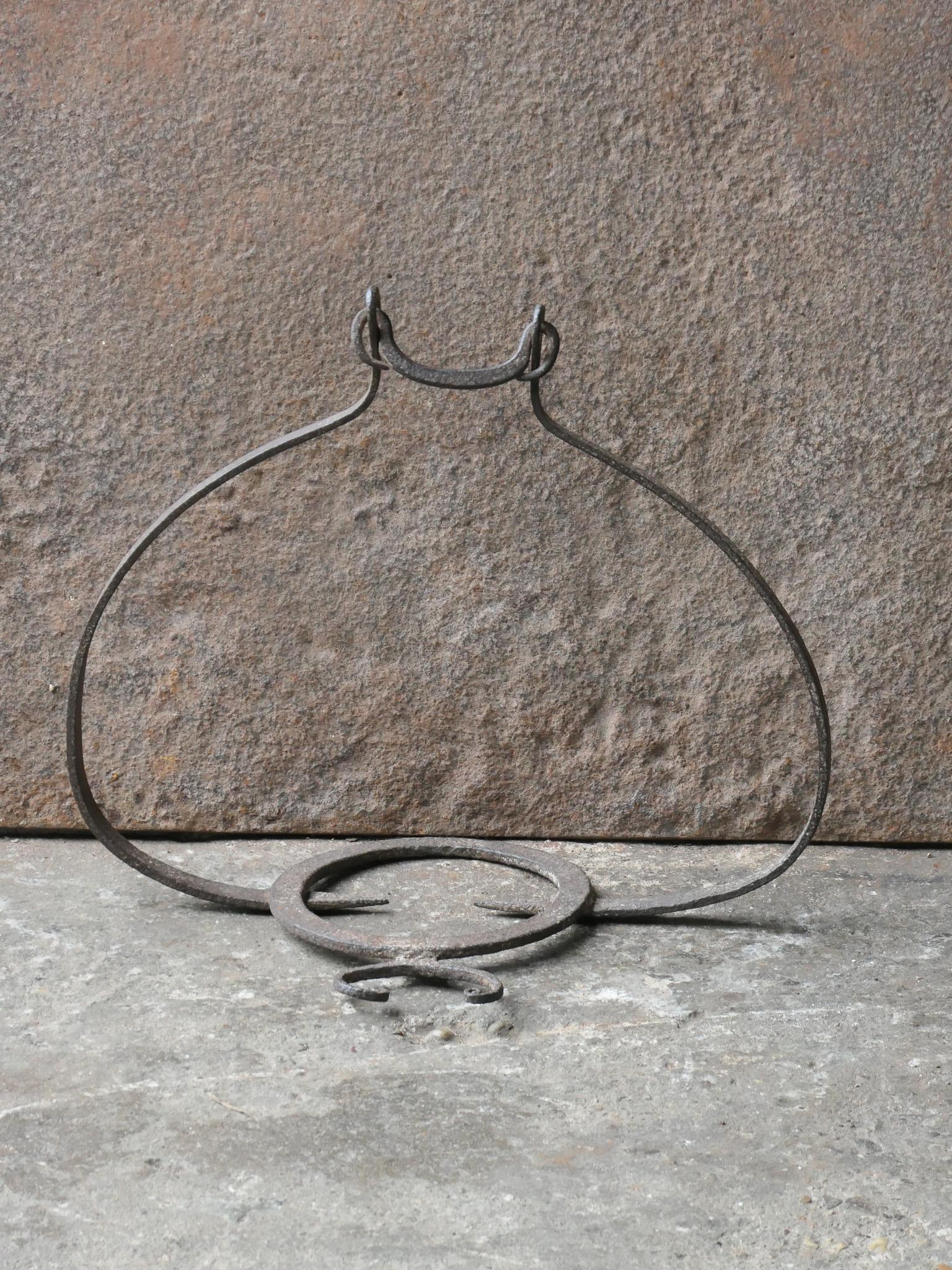 17th century French Louis XIV Period trivet. 

It is used for heating up a pan or to keep it warm in front of the fire. In a good working condition.