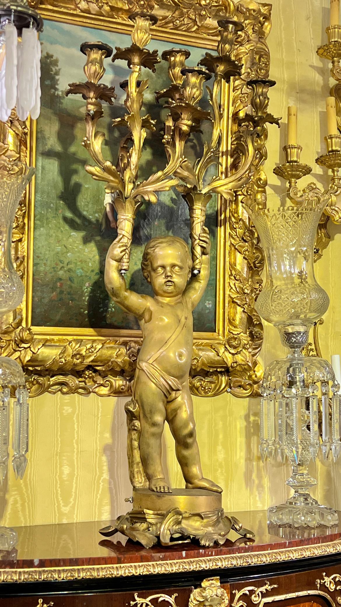 19th Century Large French 19 century Louis XVI style Cherub Figural Gilt Bronze Candelabrum For Sale