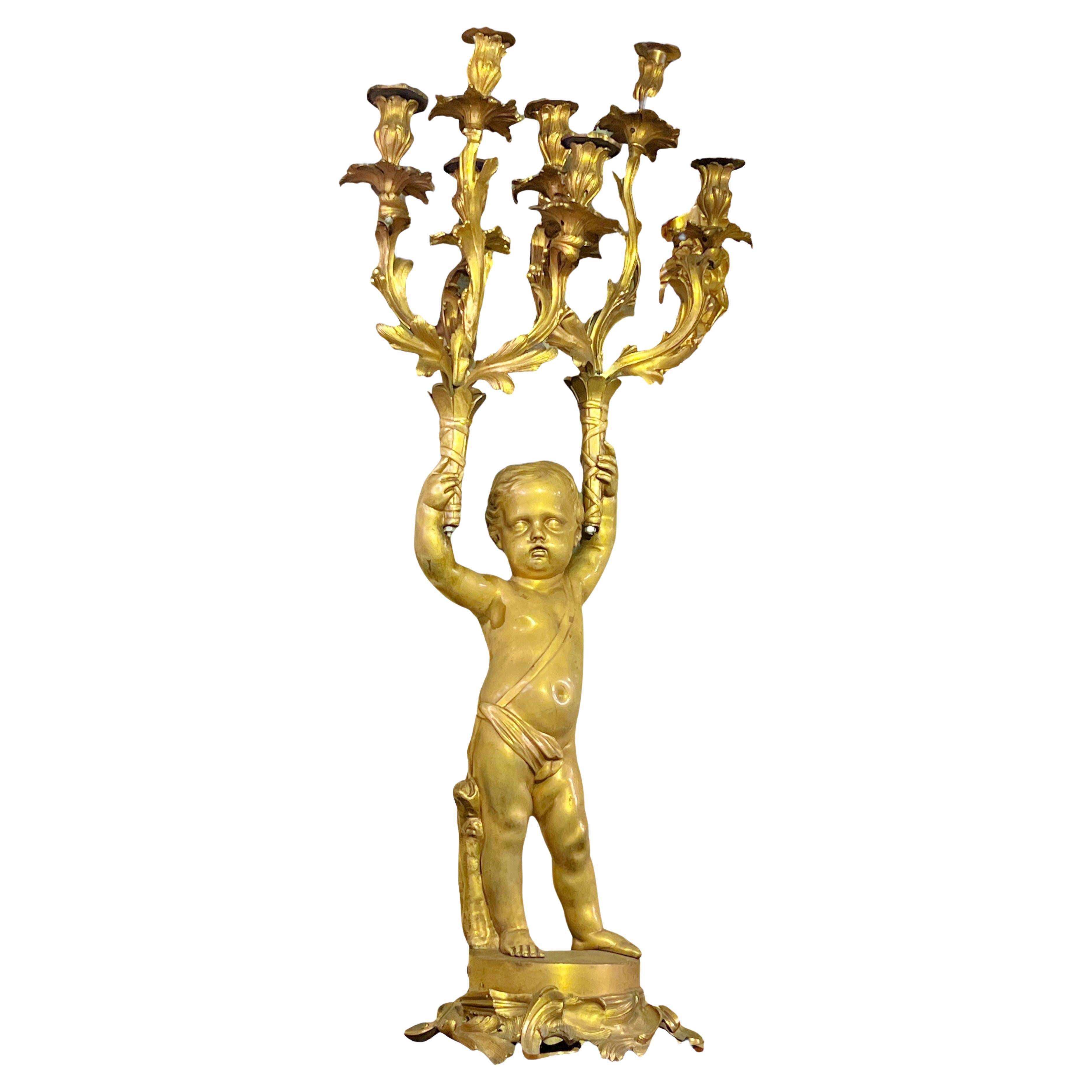 Large French 19 century Louis XVI style Cherub Figural Gilt Bronze Candelabrum For Sale