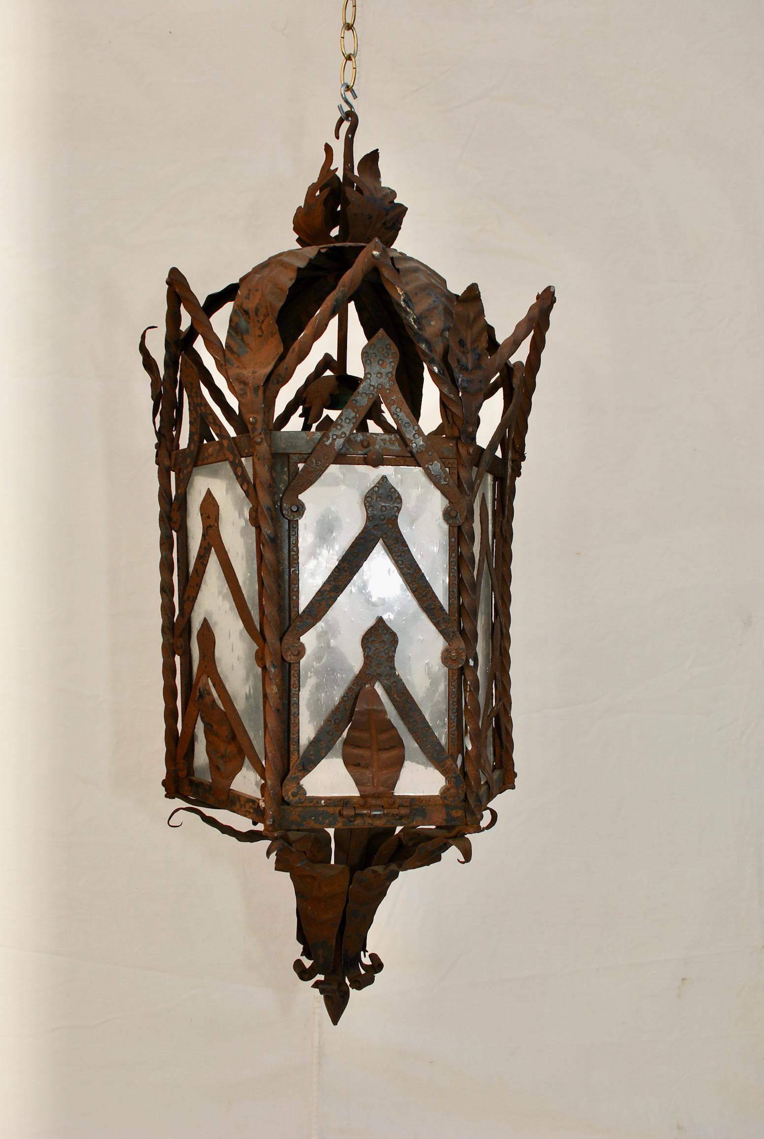 A large rustic French 1920's iron lantern, the lantern can be painted or restored, but I think it has allot of charms the way it is, especially if you want to do a rustic decor.