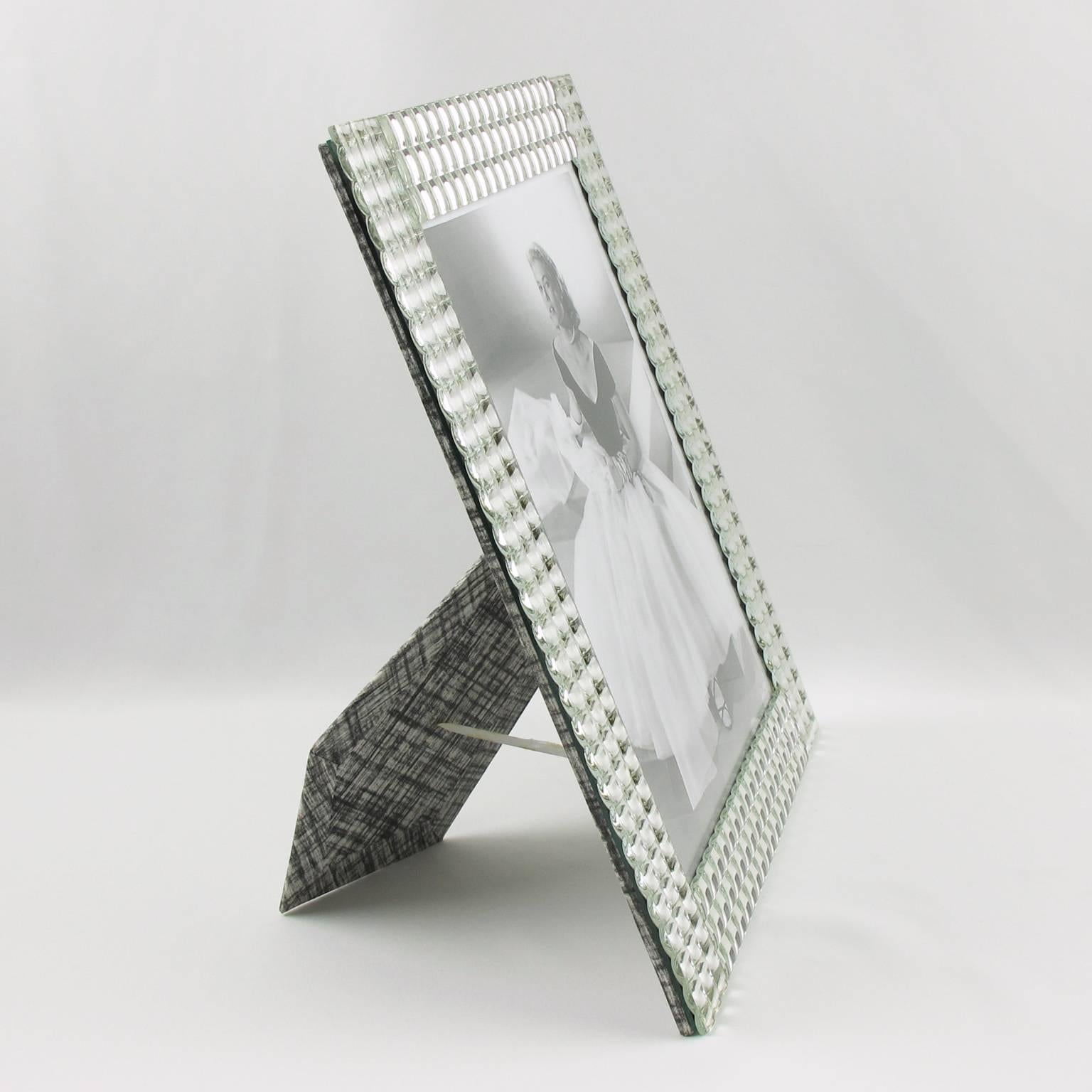 Impressive mirror picture photo frame. Lovely framing build with tiny little domed square mirrors with metallic Kinetic effect. Picture frame can be placed either in portrait or in landscape position. Back and easel in black and white textured