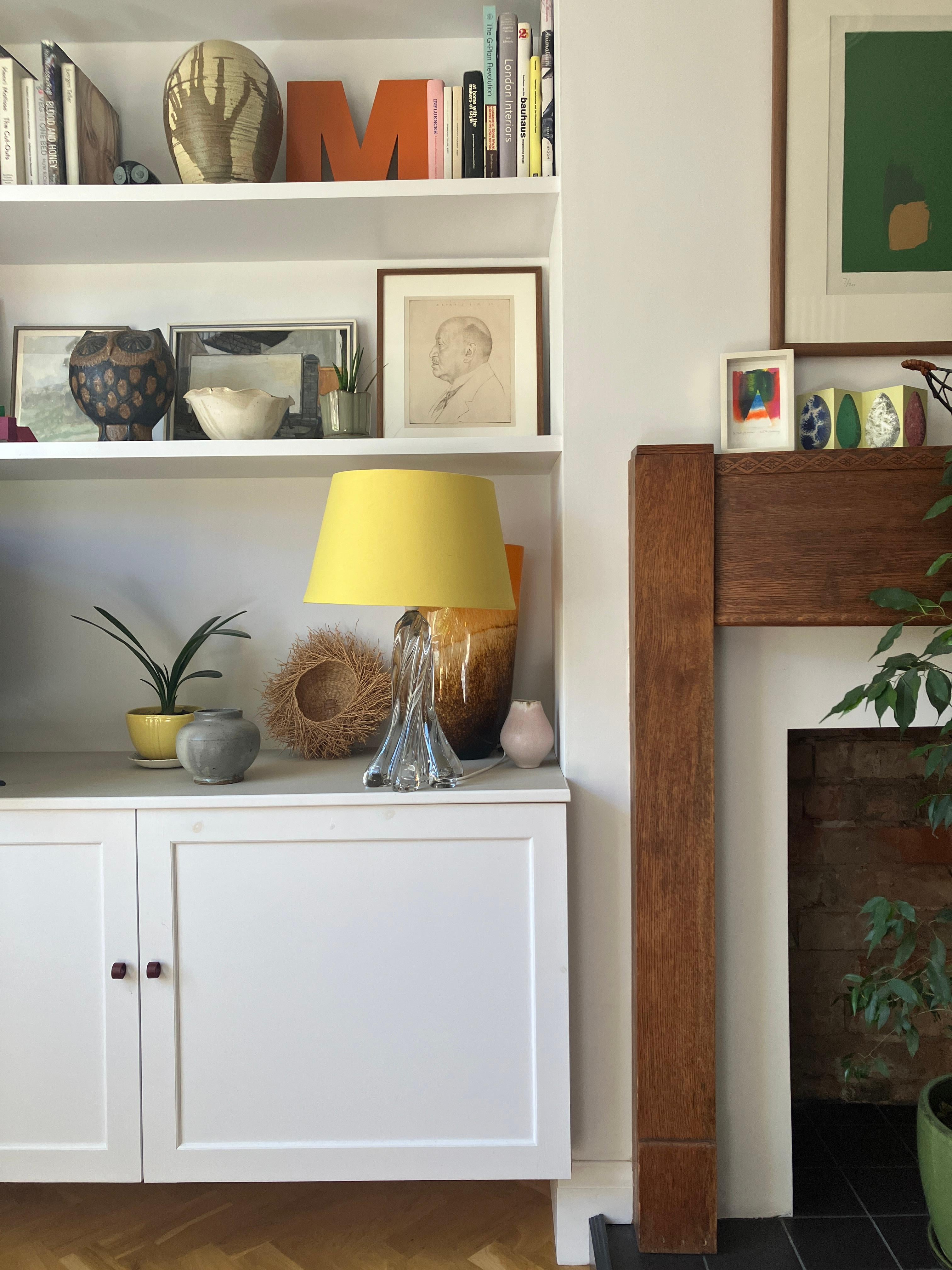 Gorgeous solid glass table lamp by Vannes le Chatel glassworks. This 1950s molded and cut glass lamp has an organic shape with a twisted design. The base is smooth with a cut glass finish. A heavy, large, high-quality table lamp, that beautifully