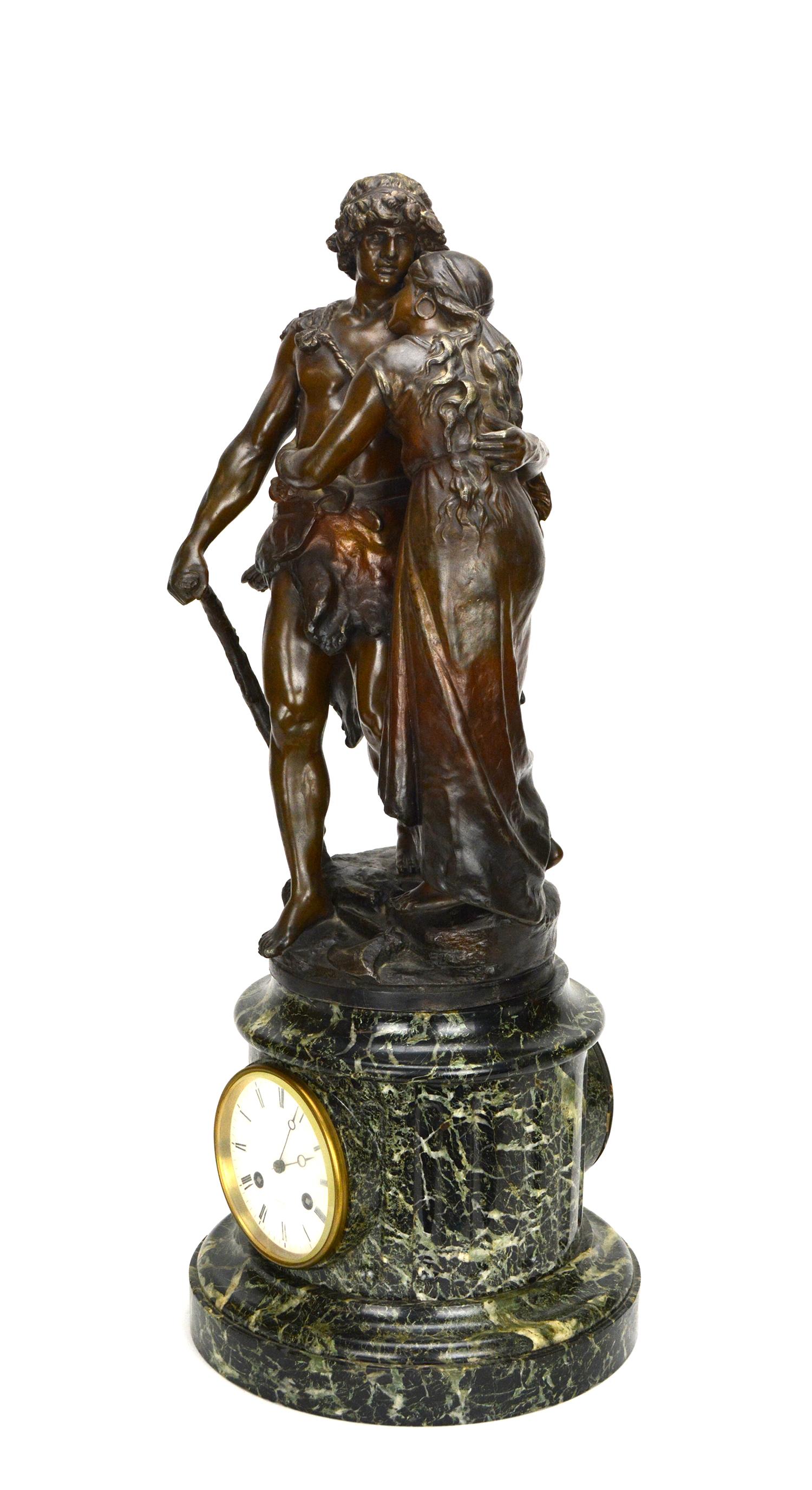 Large French 19th century Bronze Intimate Couple Figure Marble Base 8 Day Mantle Clock.

This is an amazing 19th century French tall figure marble mantle clock. The intimate couple are standing on a round green marble base, with a clock housed