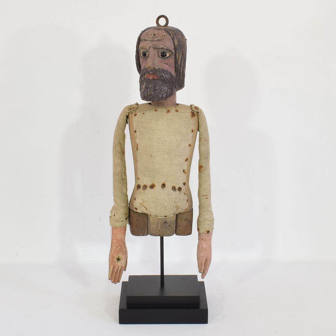 Very nice handcarved fragment of a marionette. 
France, circa 1850. Weathered, small losses and old repairs
Measurement include the wooden base.