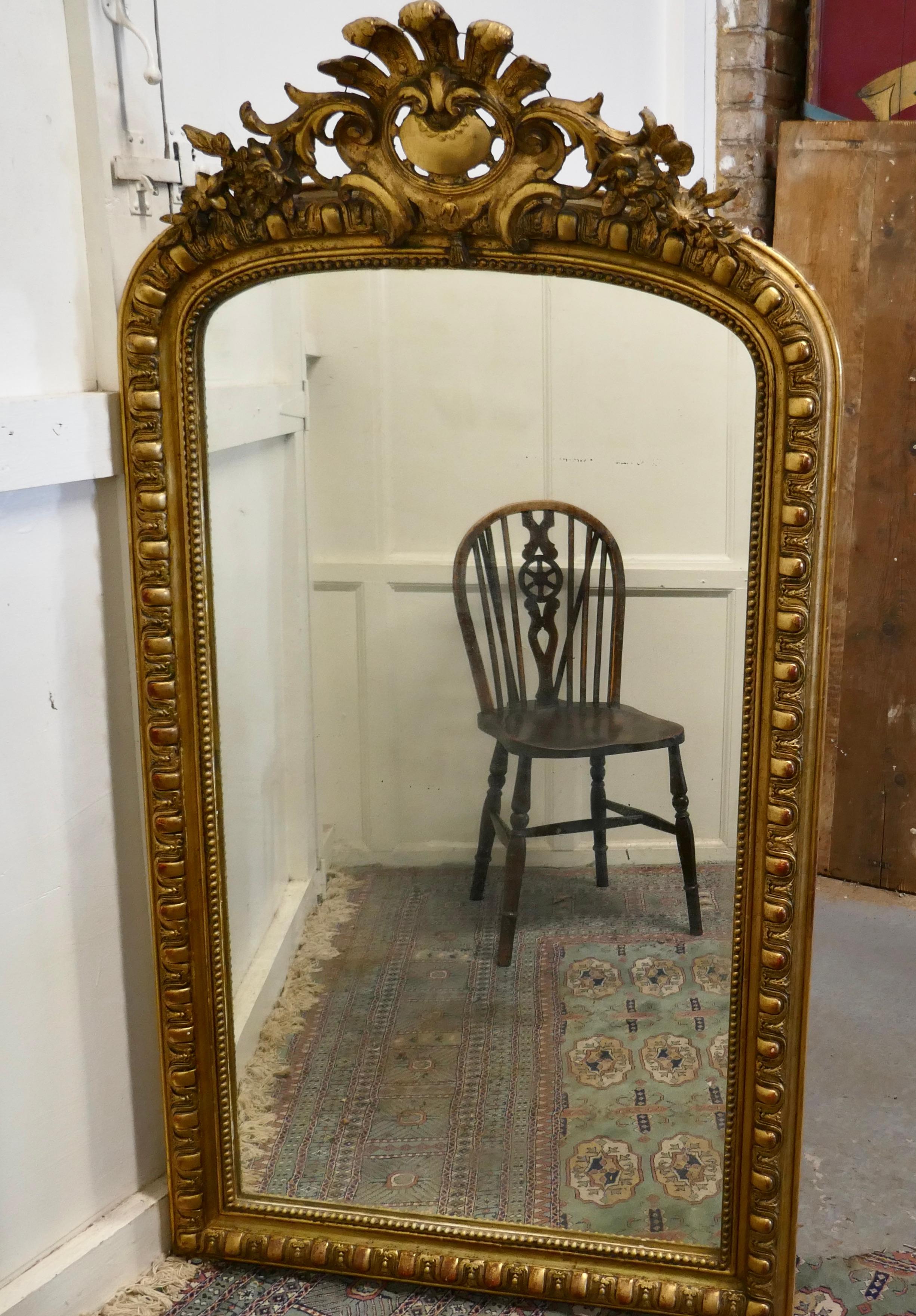 Large French 19th Century Louis Philippe Wall Mirror 
 
This is a Magnificent Statement Piece and Genuine 19th Century French Chic Furnishing, the 6” Gold frame has a charming original gilt finish it is decorated with an attractive edging around