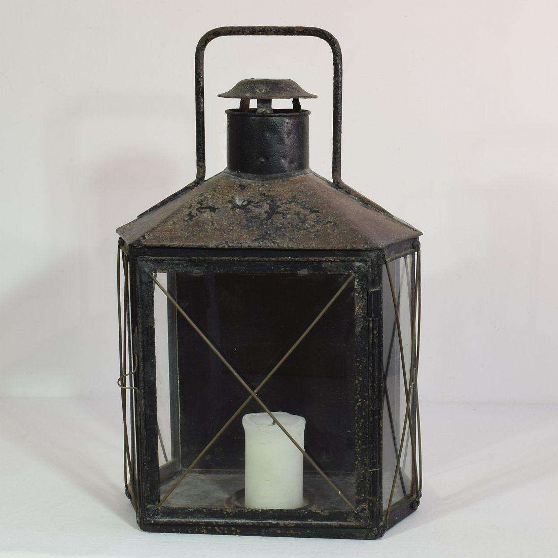 Beautiful and rare large metal lantern. Glass of later date. France, 19th century. Weathered and old repairs.