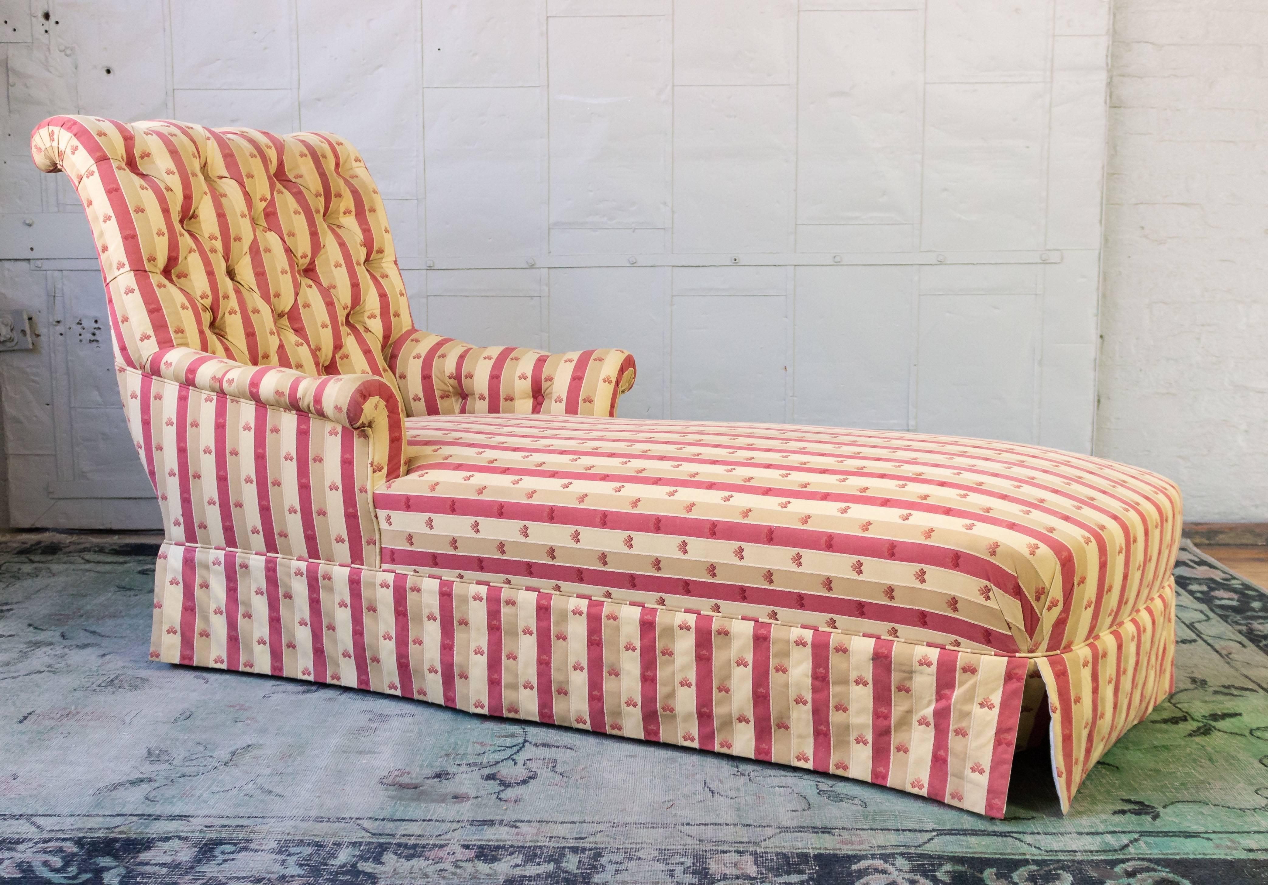 An exquisite French Napoleon III chaise lounge. Take comfort and relaxation to a whole new level with this attractive French late 19th century Napoleon III scrolled back chaise longue. Recently upholstered in a beautiful patterned striped fabric,