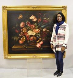 Grande peinture à l'huile française représentant une nature morte dans un cadre doré de 58 x 70, avec un bouquet de fleurs