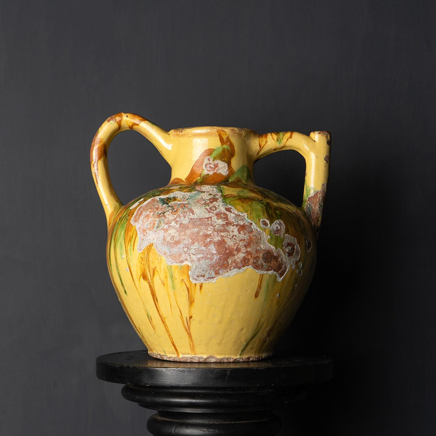 JASPE EARTHENWARE POTTERY WATER/WINE JUG OR GARGOULETTE

Gargoulettes were originally used to pour water or wine at the table.

Hugely decorative form, colouration and wear.

Marbled greens browns and yellow glaze.

The pot is structurally sound.
