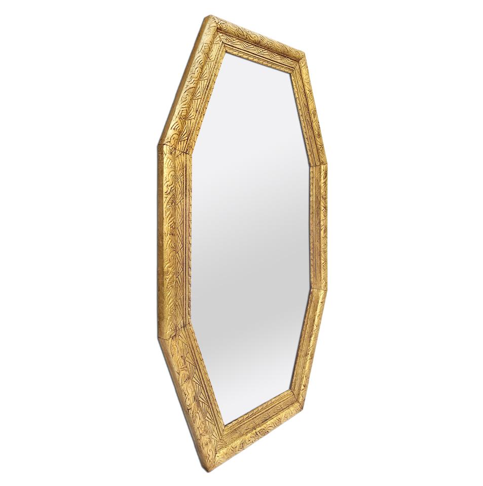 Large antique octagonal giltwood mirror with geometric 1930s decors. Re-gilding to the leaf patinated. Modern glass mirror. Antique wood back. Antique frame width 6 cm / 2.36 in.